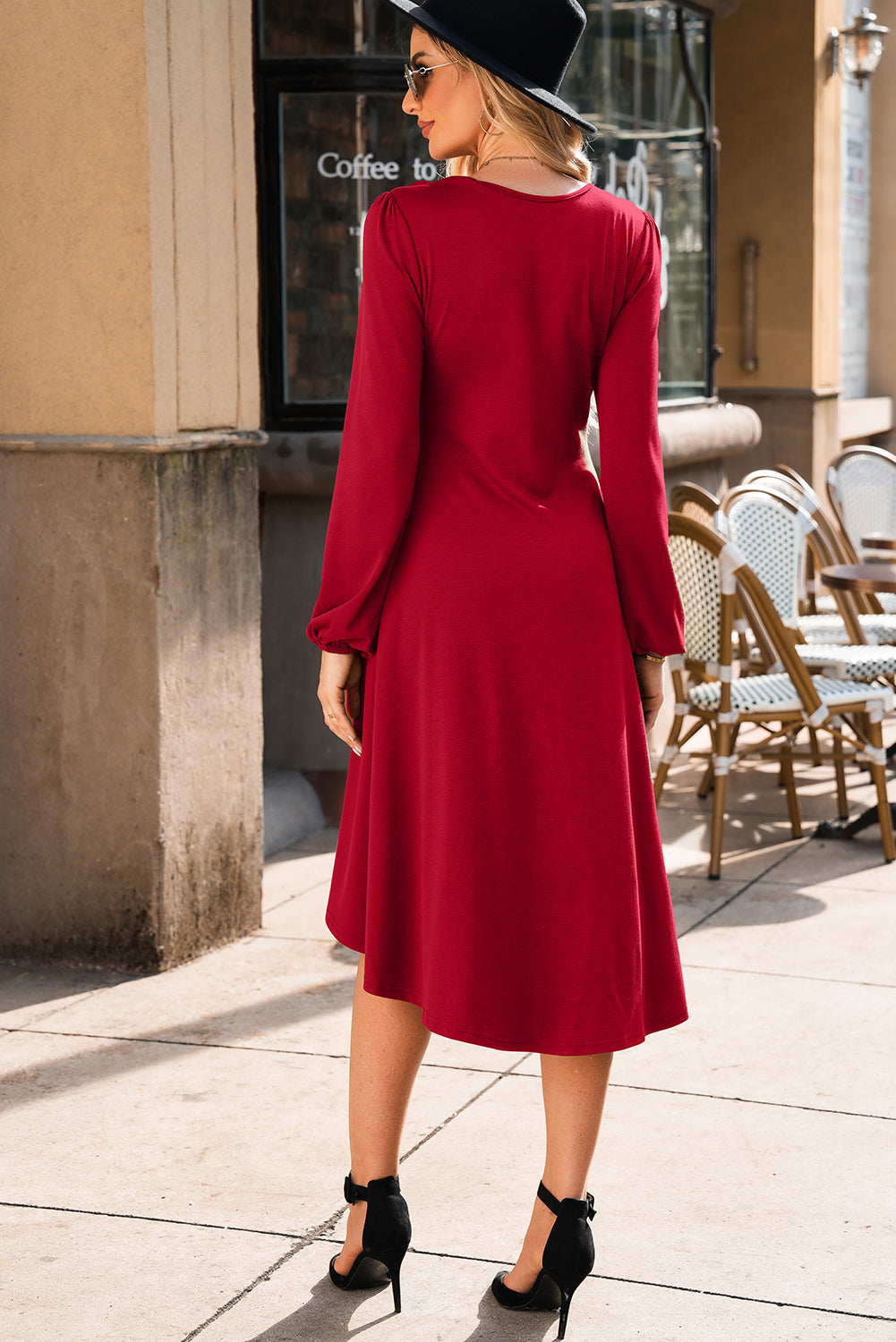 Red ruched midi dress back view showing fit