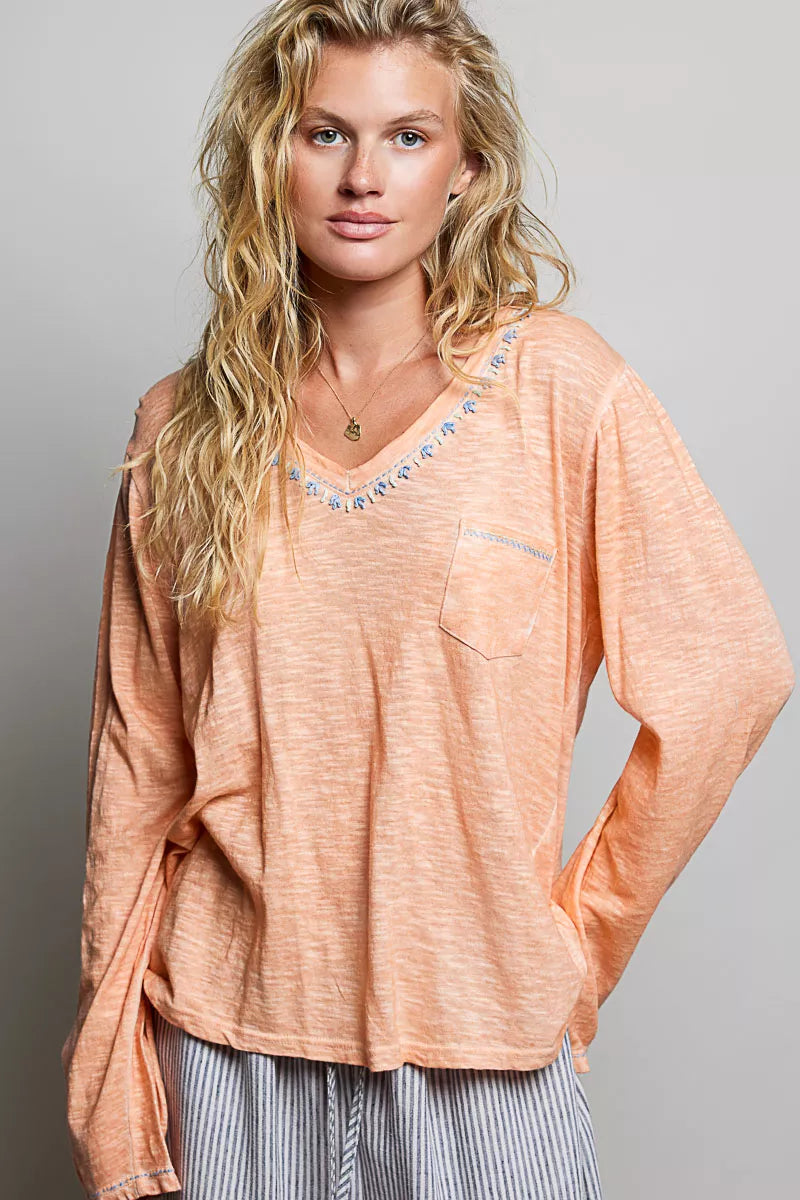 Coral peach contrast stitch v neck long sleeve knit top front view