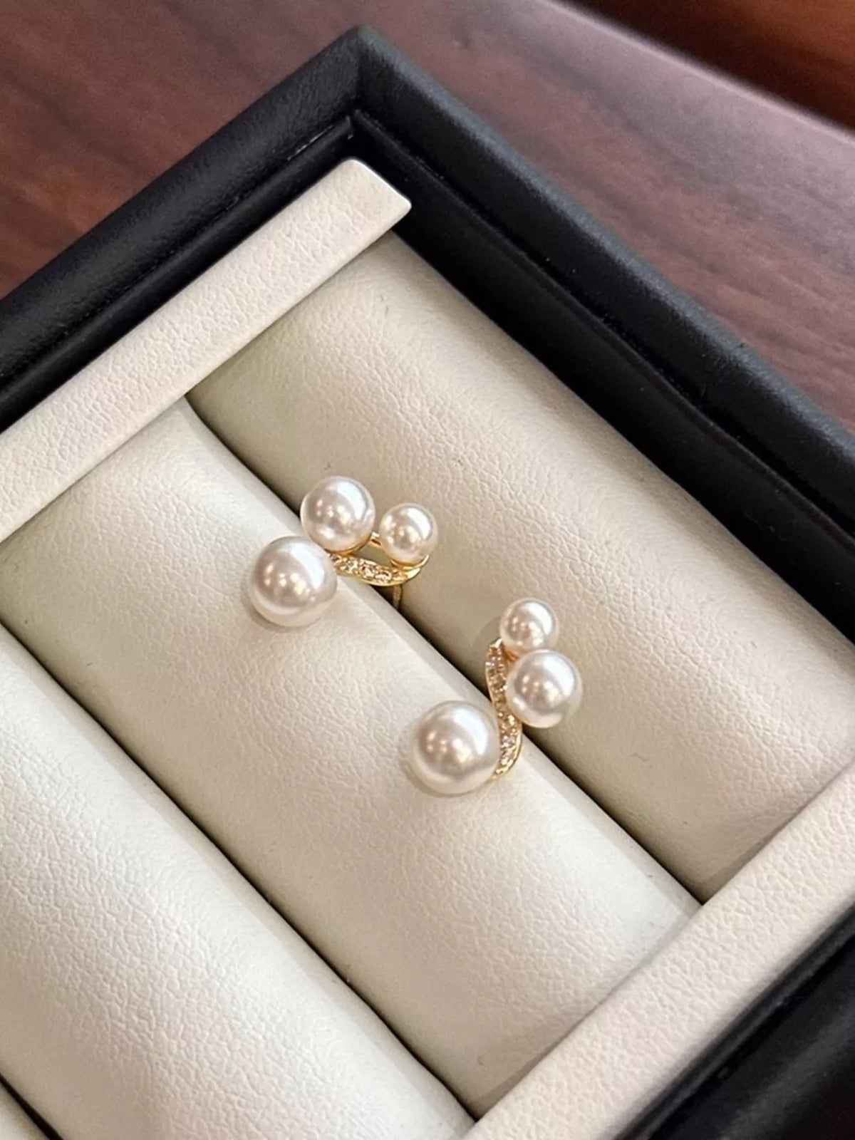 White pearl cluster stud earrings front view
