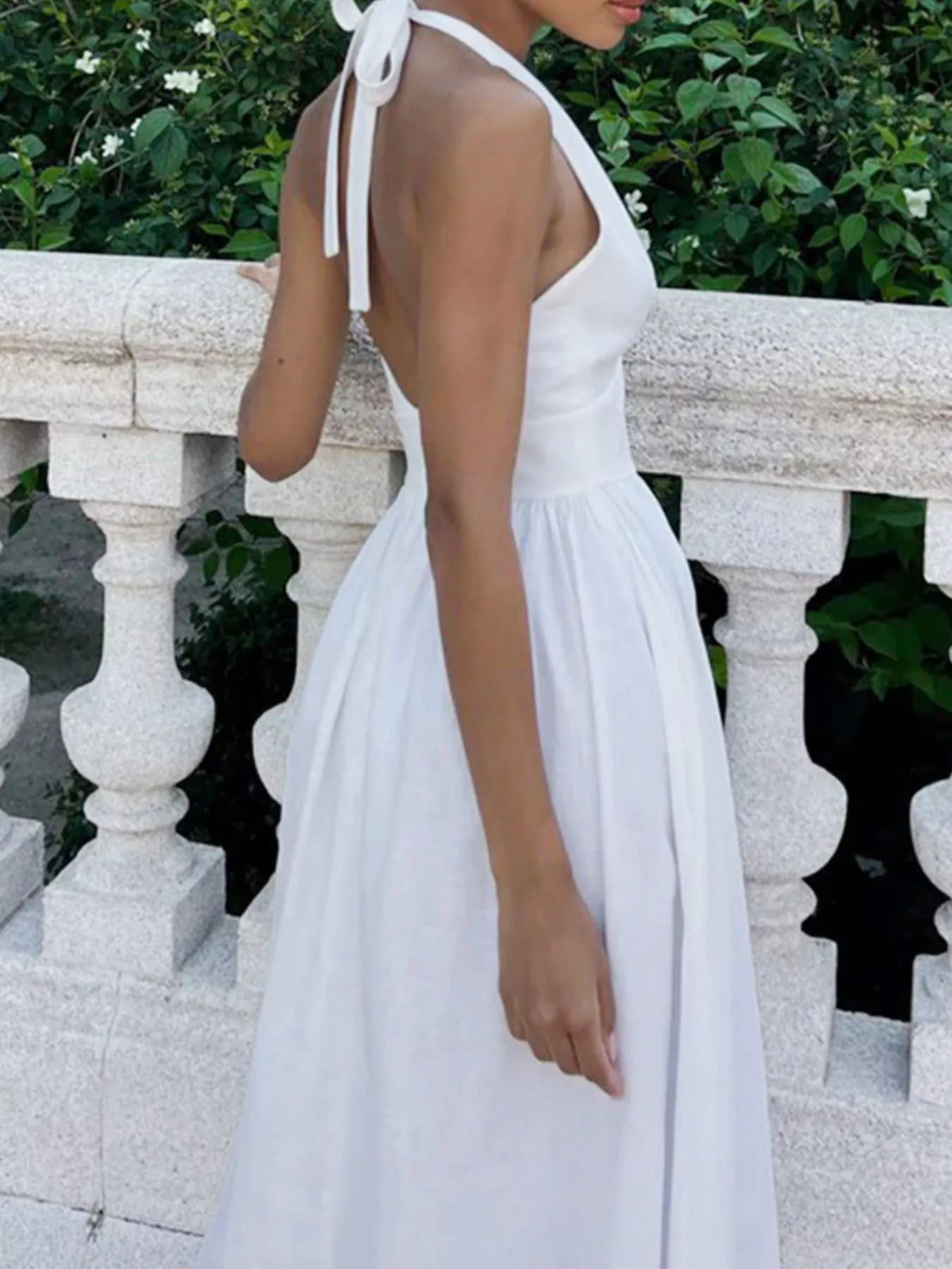 white halter neck tied flowy maxi dress full length view