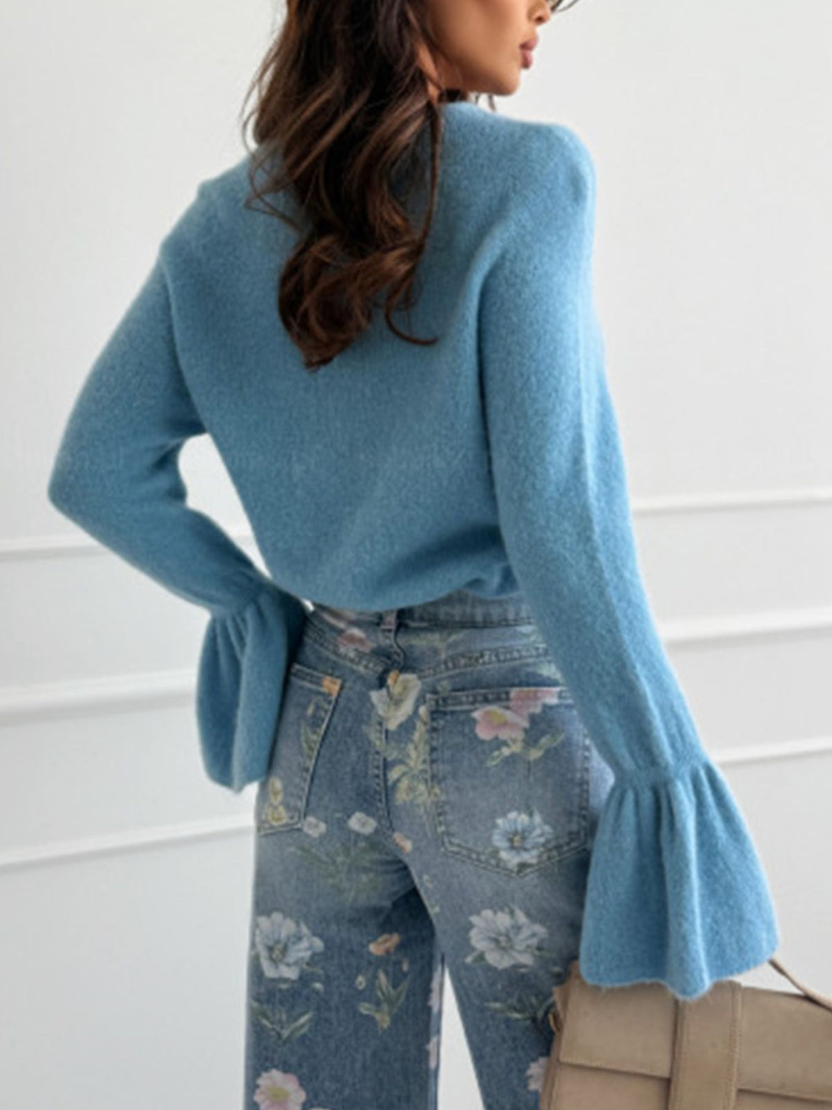 Soft ribbed flounce sleeve sweater close up