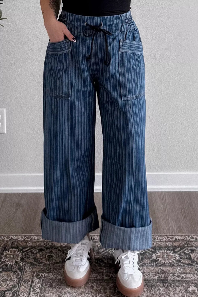 Dark wash striped wide leg jeans front view