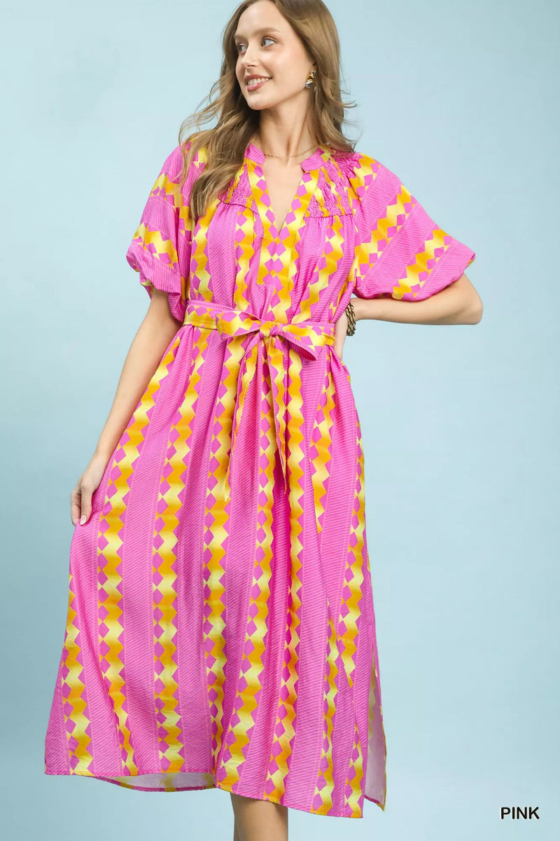 Pink geo stripe smocked waist tie dress front view