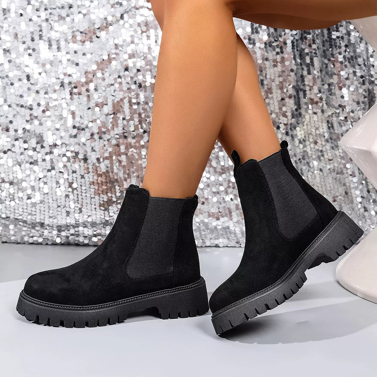 Ankle boots styled on model