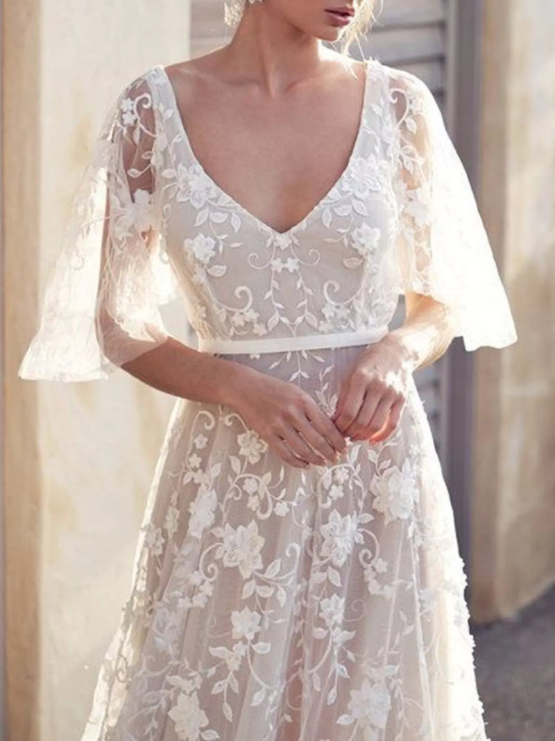 White lace flutter sleeve V neck dress front view