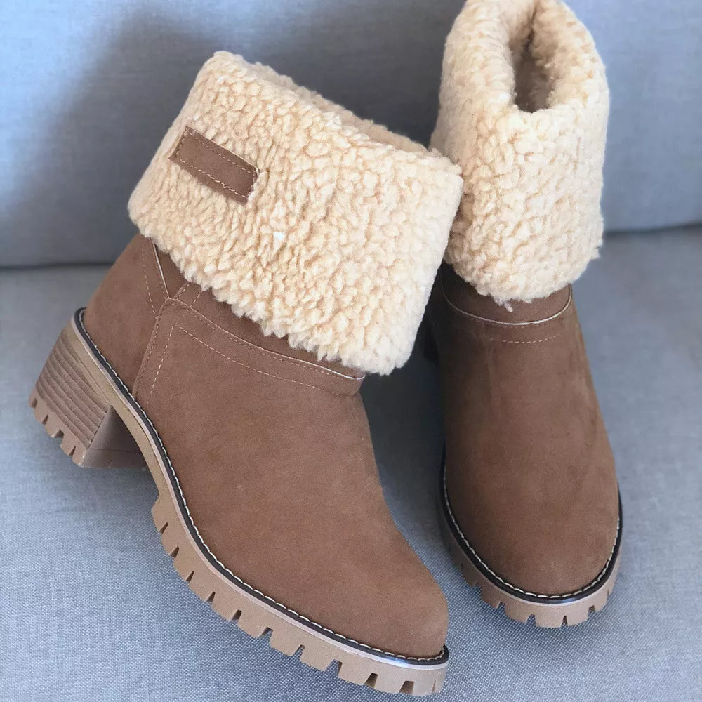 Suede round toe block heel boots angled view