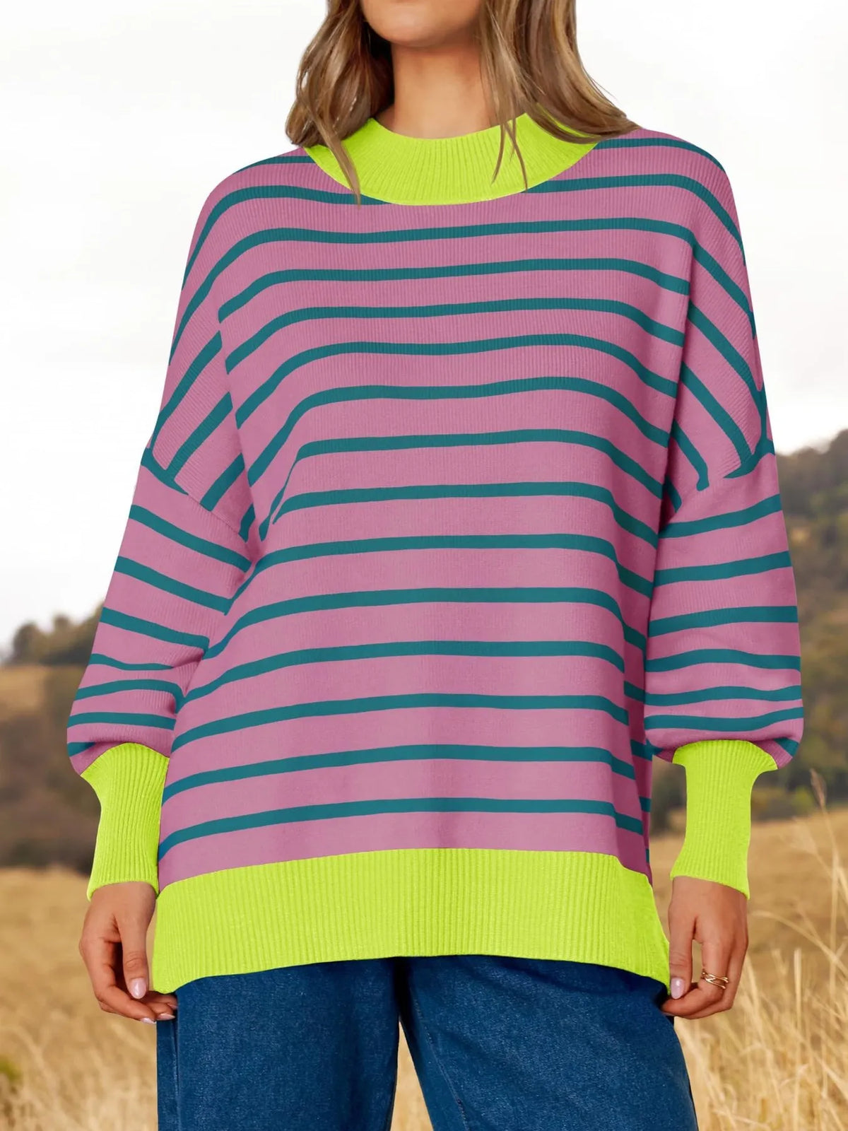 Sleeve detail of striped knit sweater