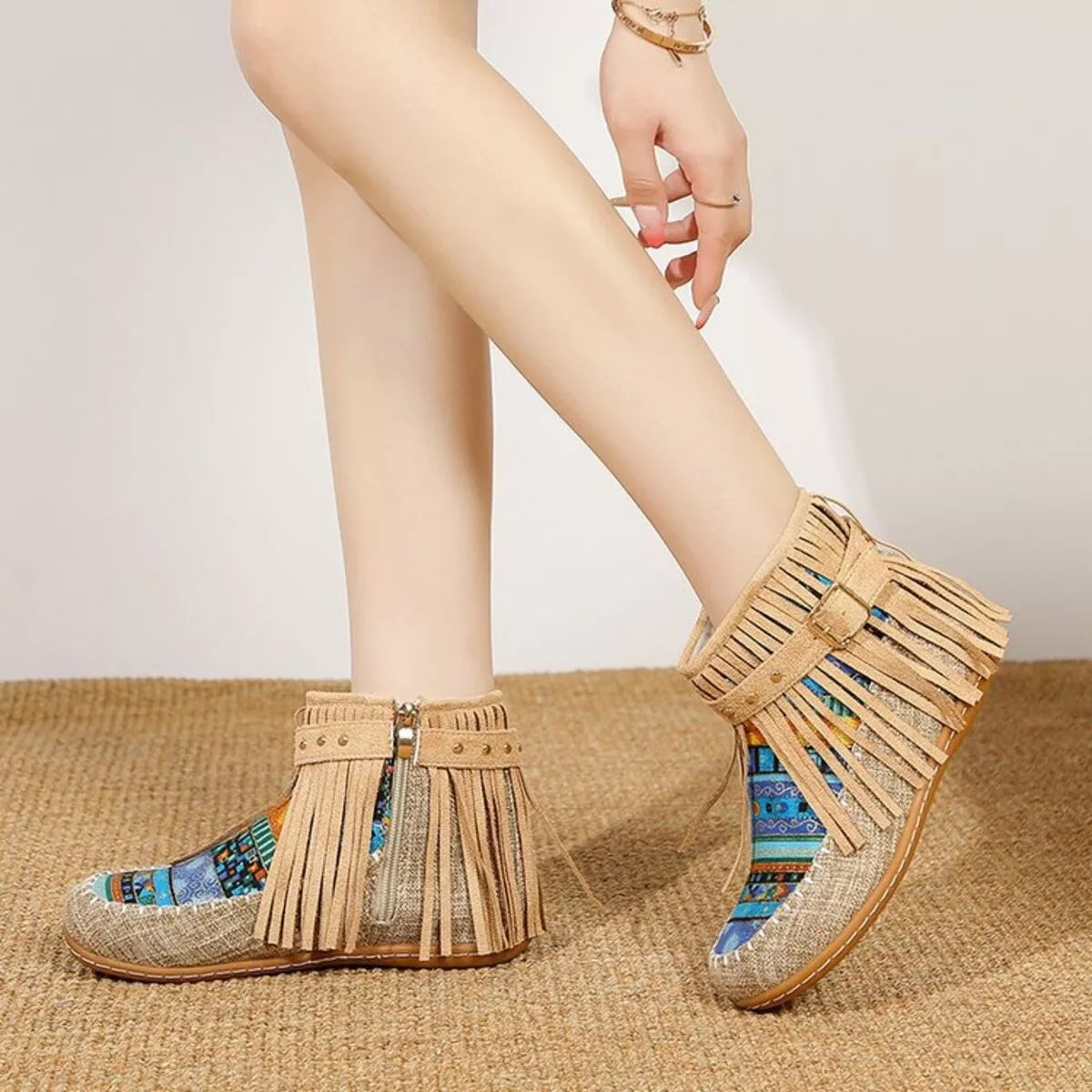 Fringe side zipper ankle boots, upper texture close up