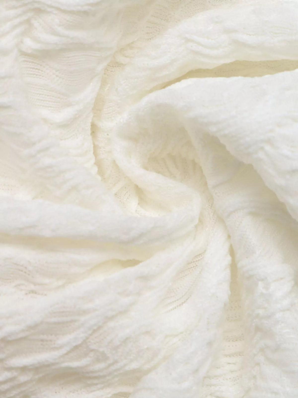 Fabric texture close up on stretch ruffled top