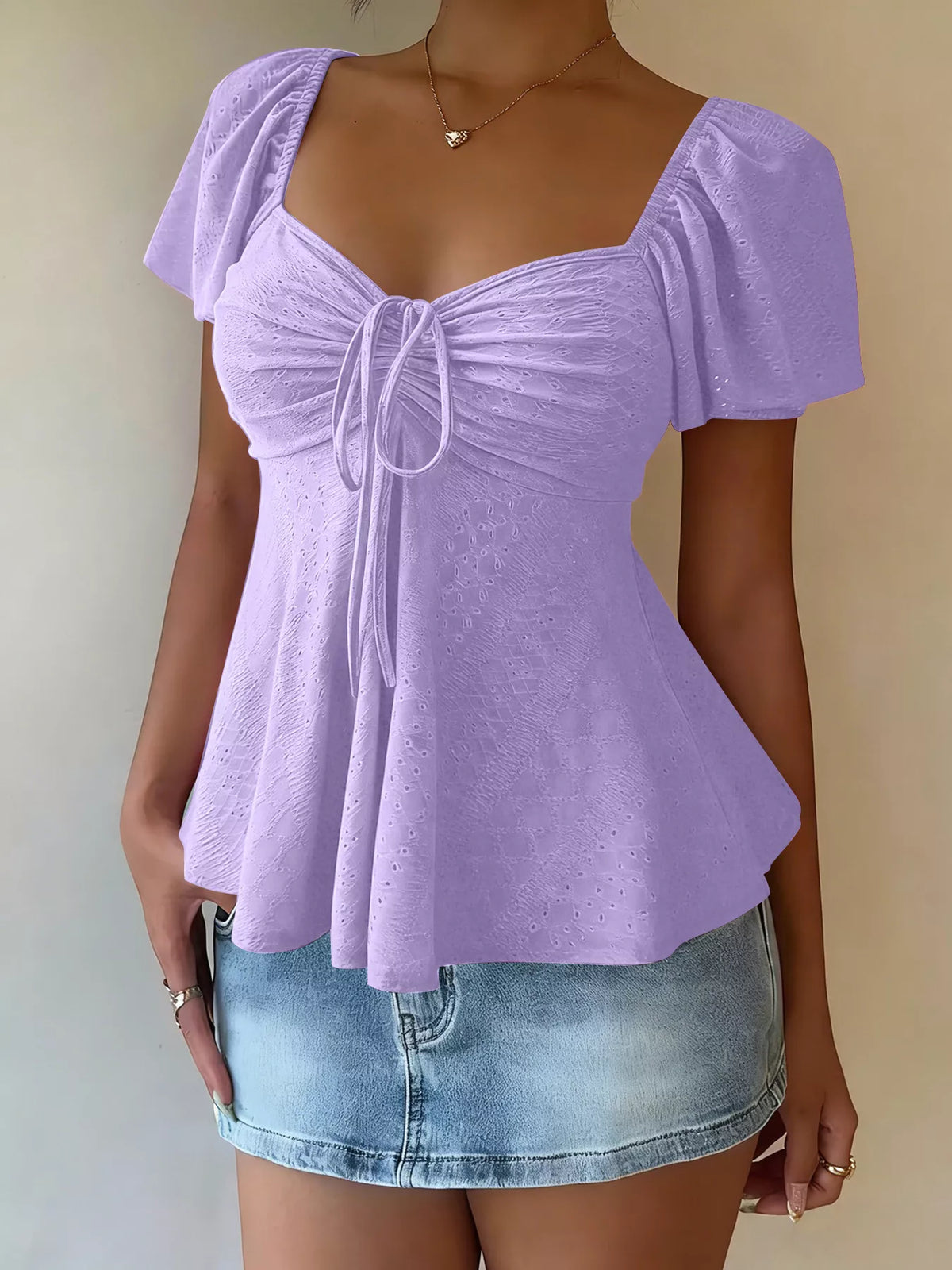 Eyelet top shown in a rich wine red tone