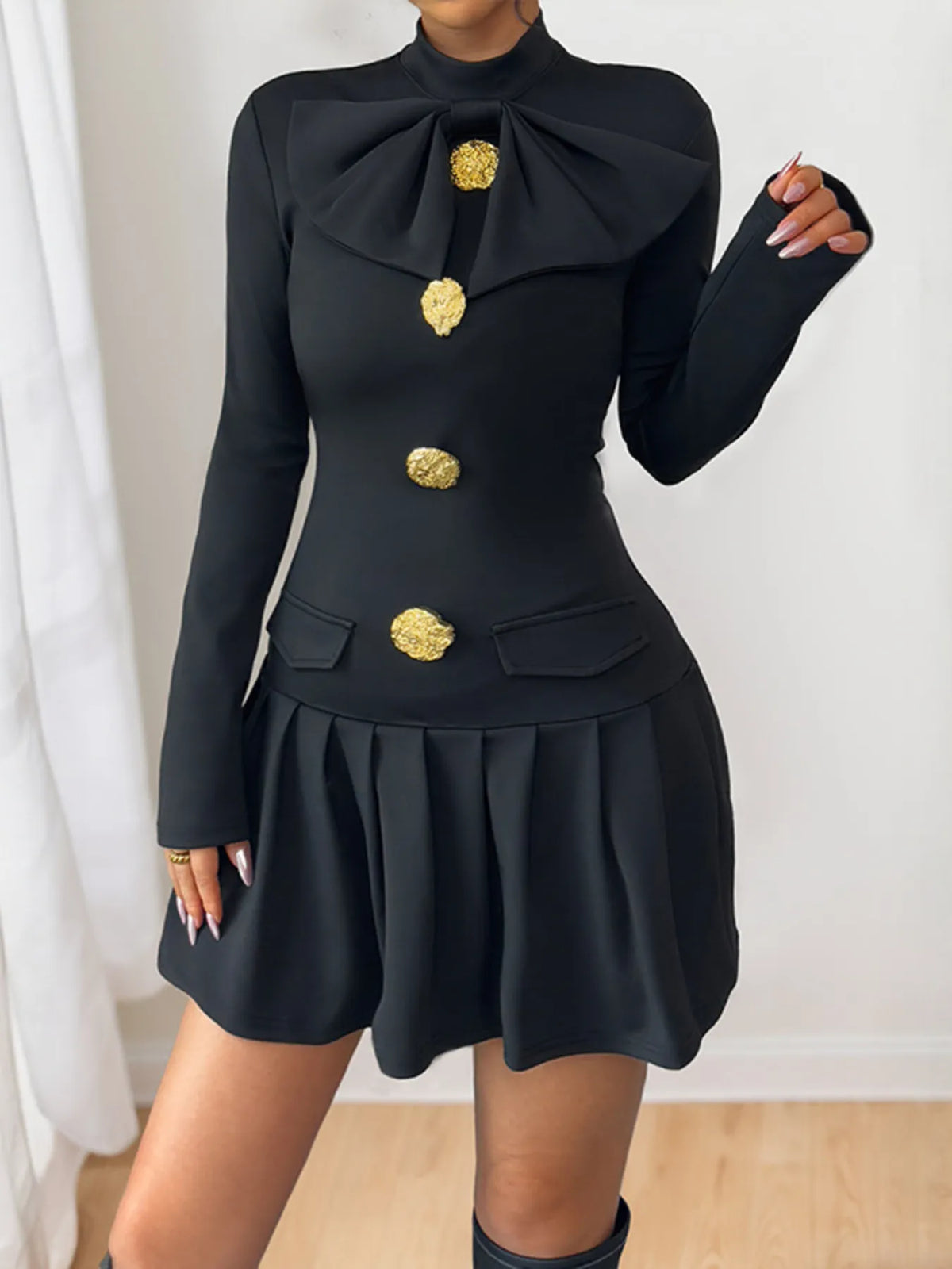 Black button mock neck long sleeve mini dress side view