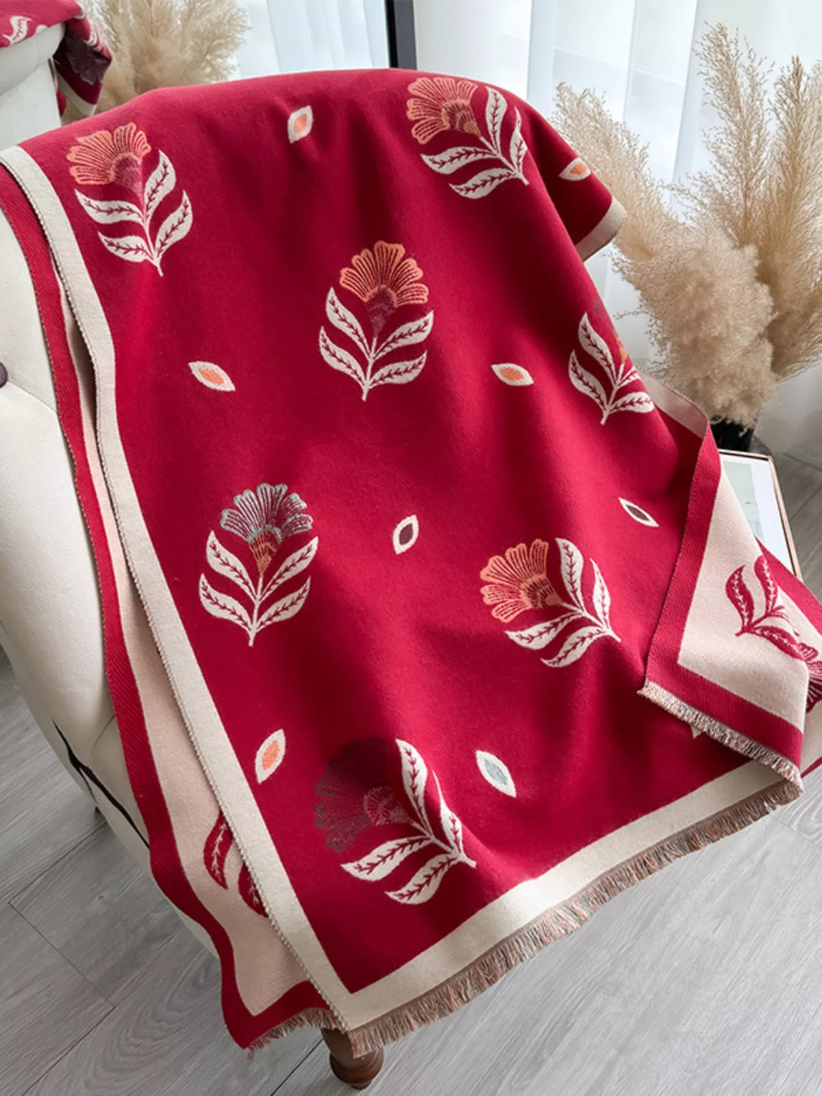 Printed raw hem shawl over the shoulders