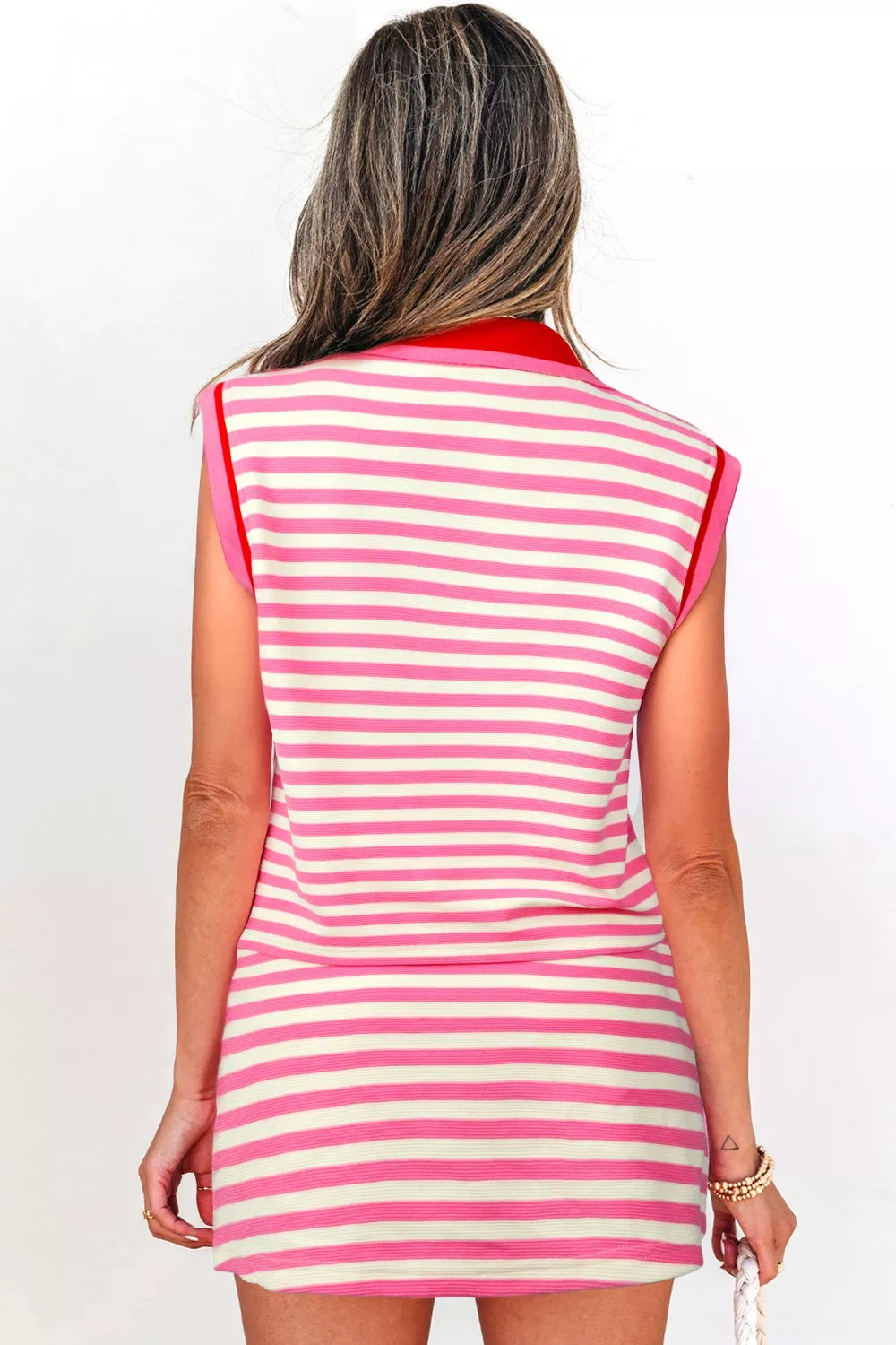 Striped sleeveless top with half zip neckline detail