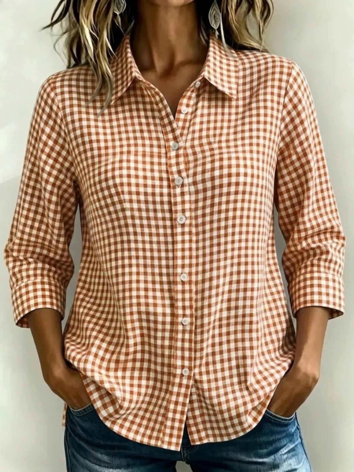 Plaid shirt worn open as a casual layer