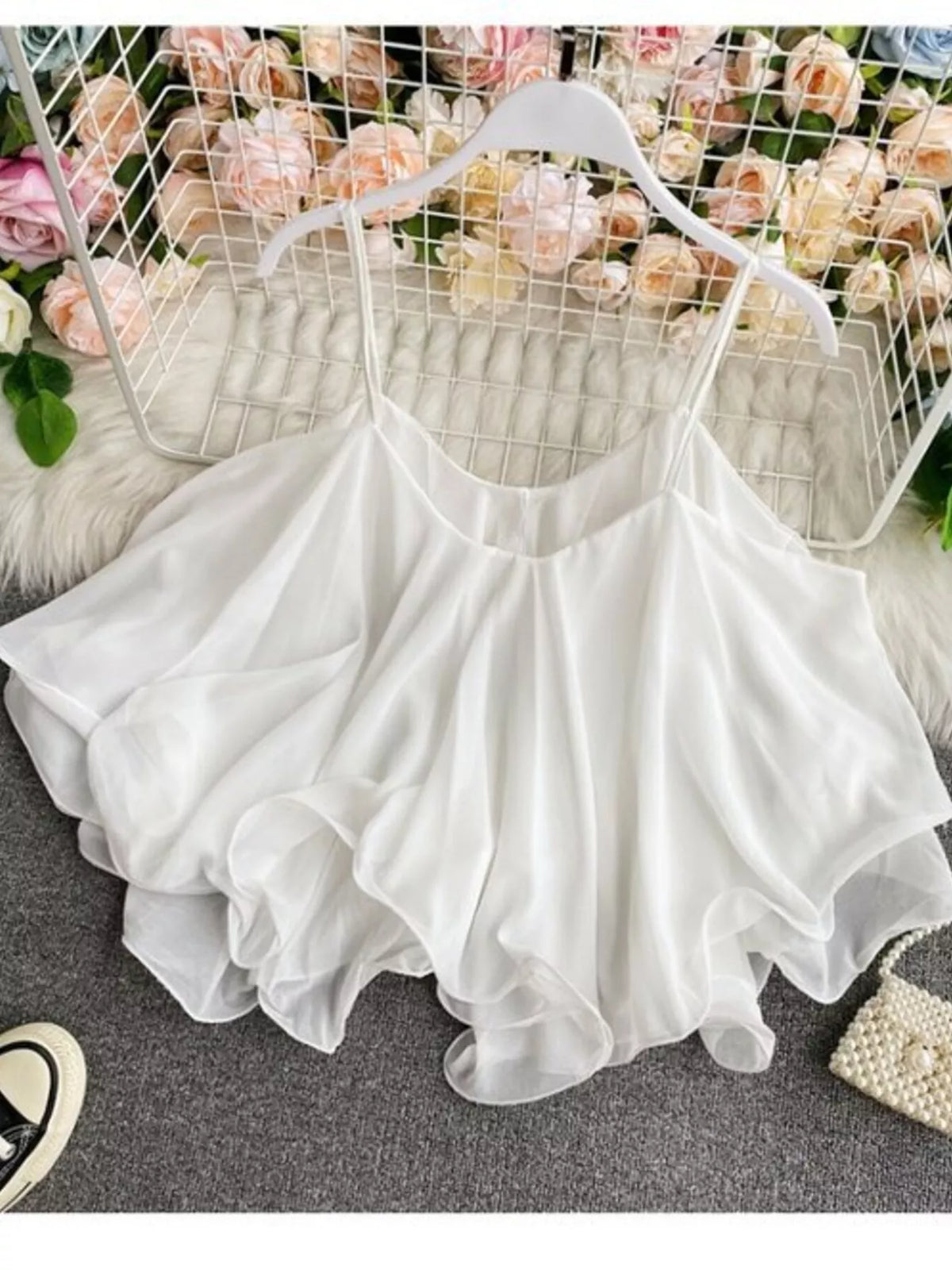 Ruffled flowy cami top fabric detail