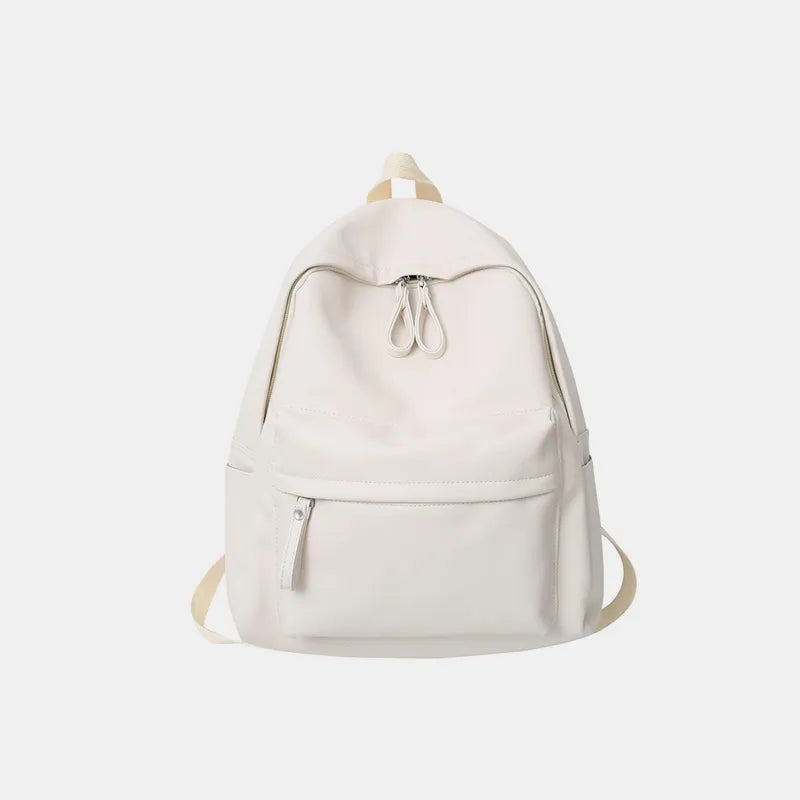 Faux leather zip backpack flat lay styling