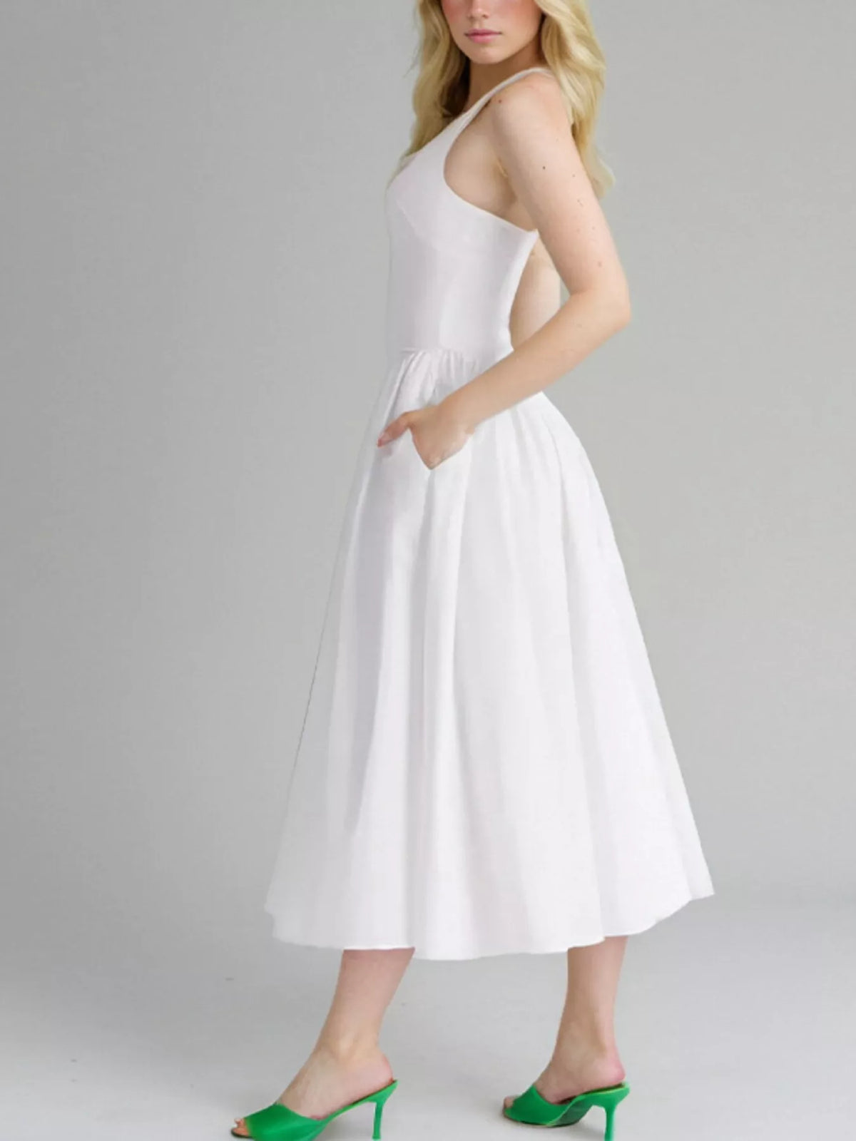 Halter neck midi dress with pockets back view