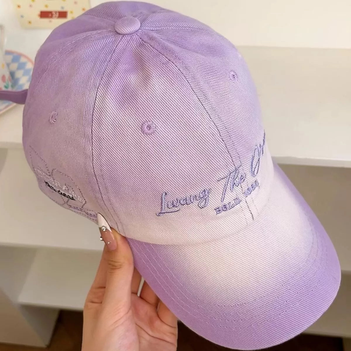 Gradient fade detail across the cap panels