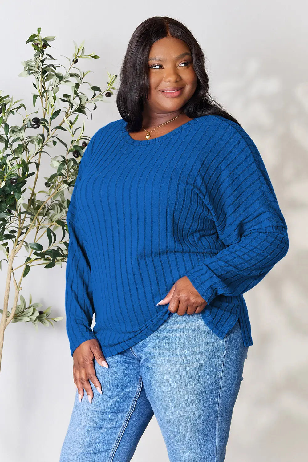 Detail of round neckline on ribbed top