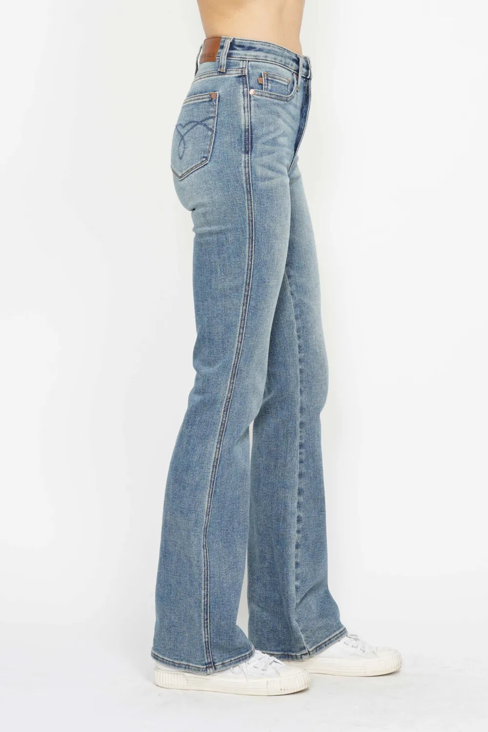 Bootcut jeans with tummy control waist shown from the side