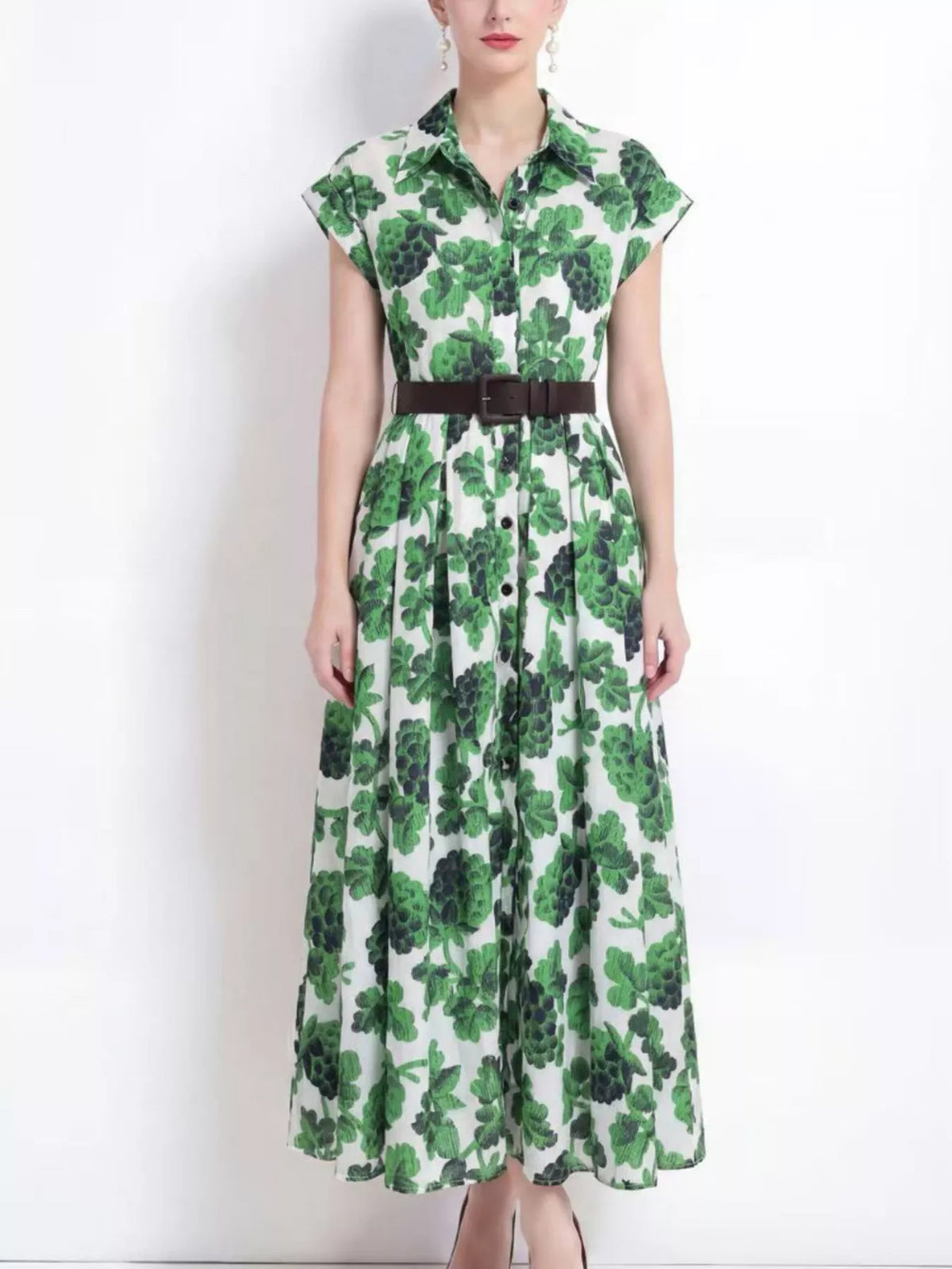 Cap sleeve printed dress shown on a model
