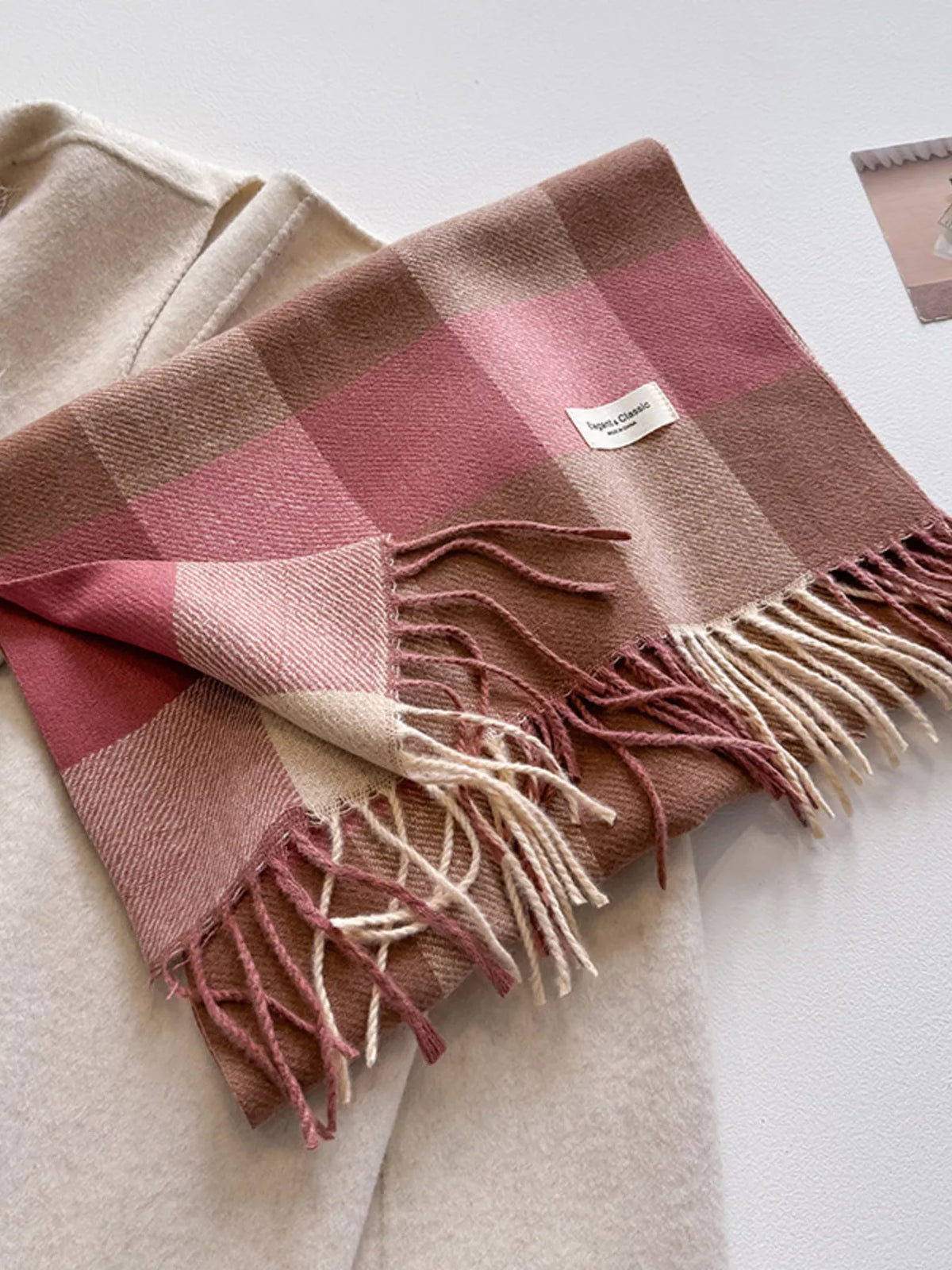 Fringe detail of the plaid blanket scarf