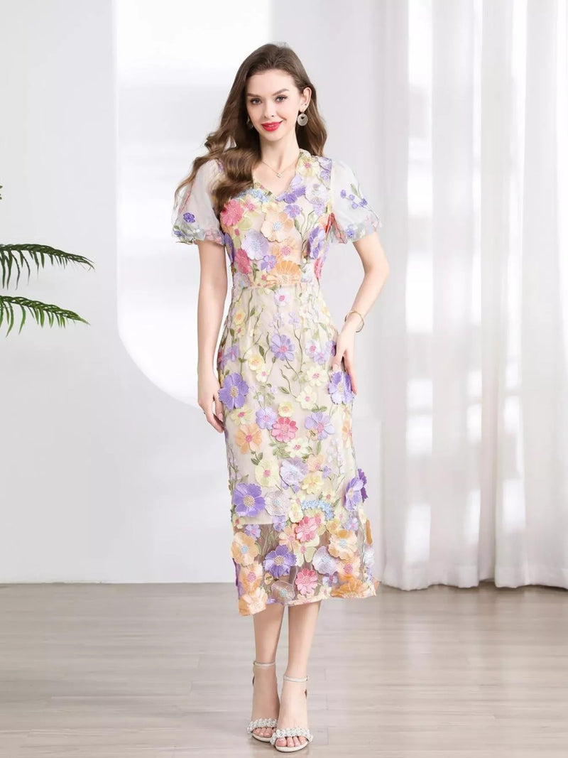 Brocade floral embroidered puff sleeve midi dress in purple front view