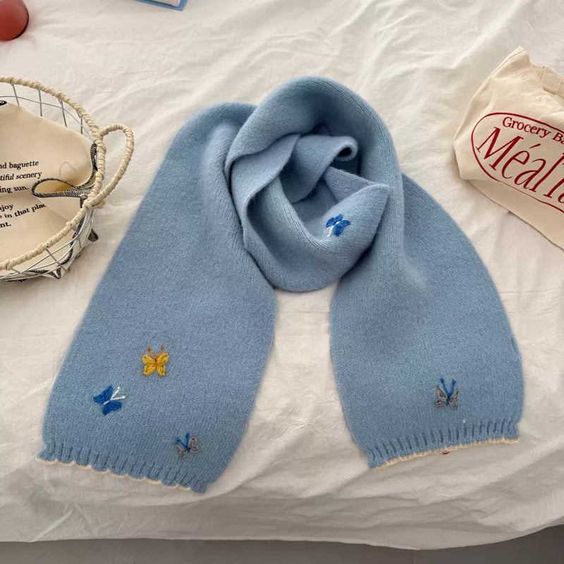 Detail of the knit texture and butterfly motif