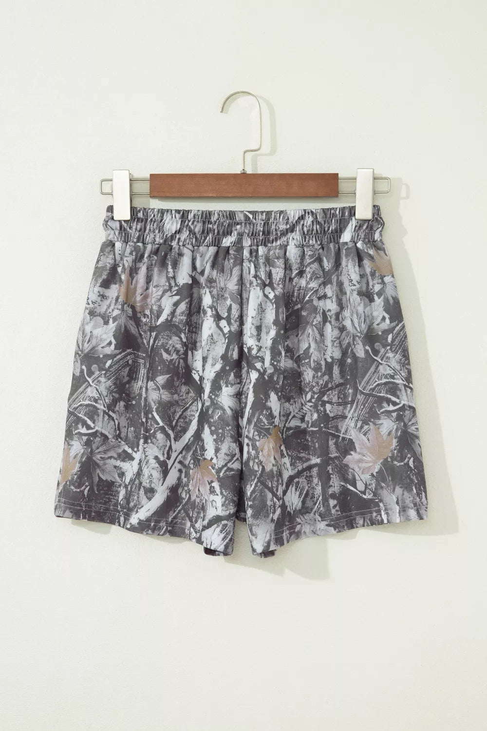 Grey abstract maple leaf print drawstring shorts detail view