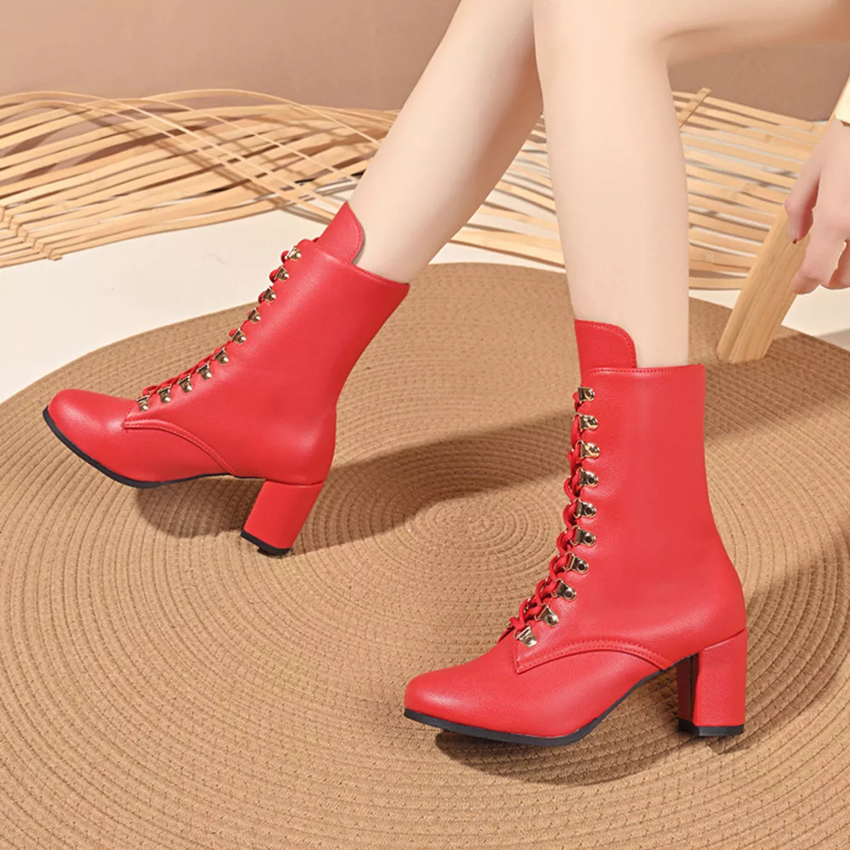 Lace up block heel boots angled view