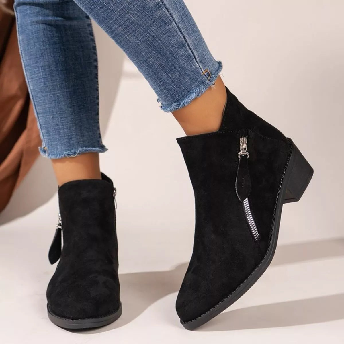 Leopard point toe block heels boots angled three quarter view