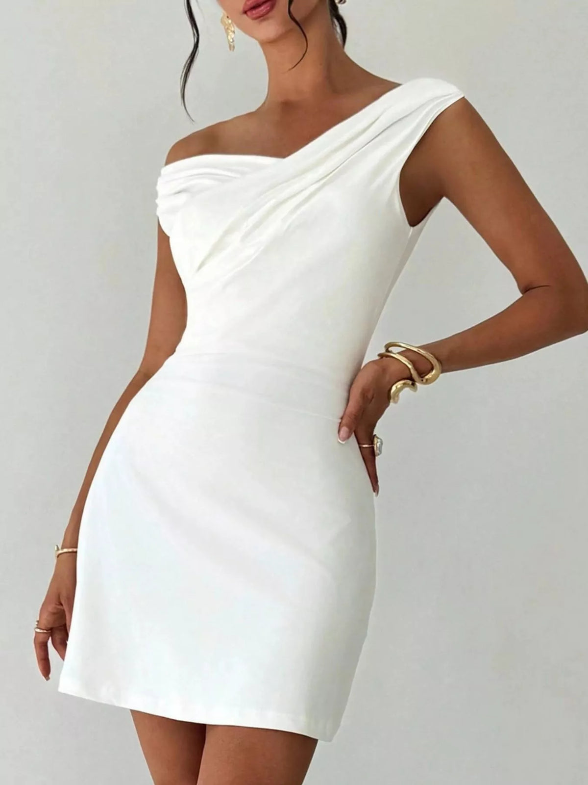 White off shoulder draped mini dress, back view