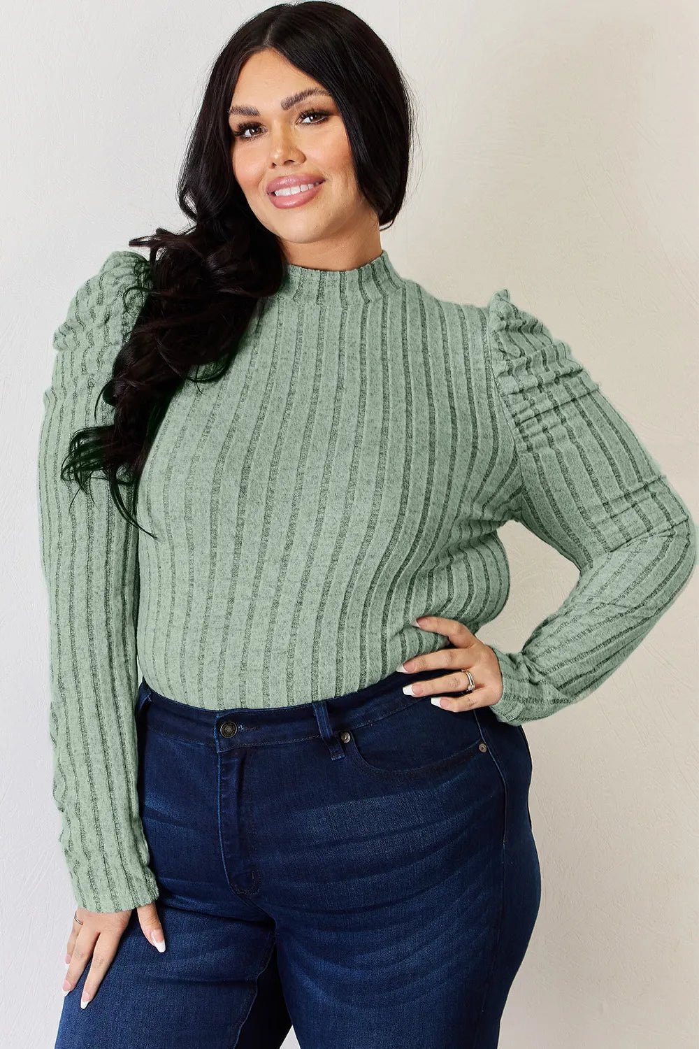 Mock neck puff sleeve top walking view