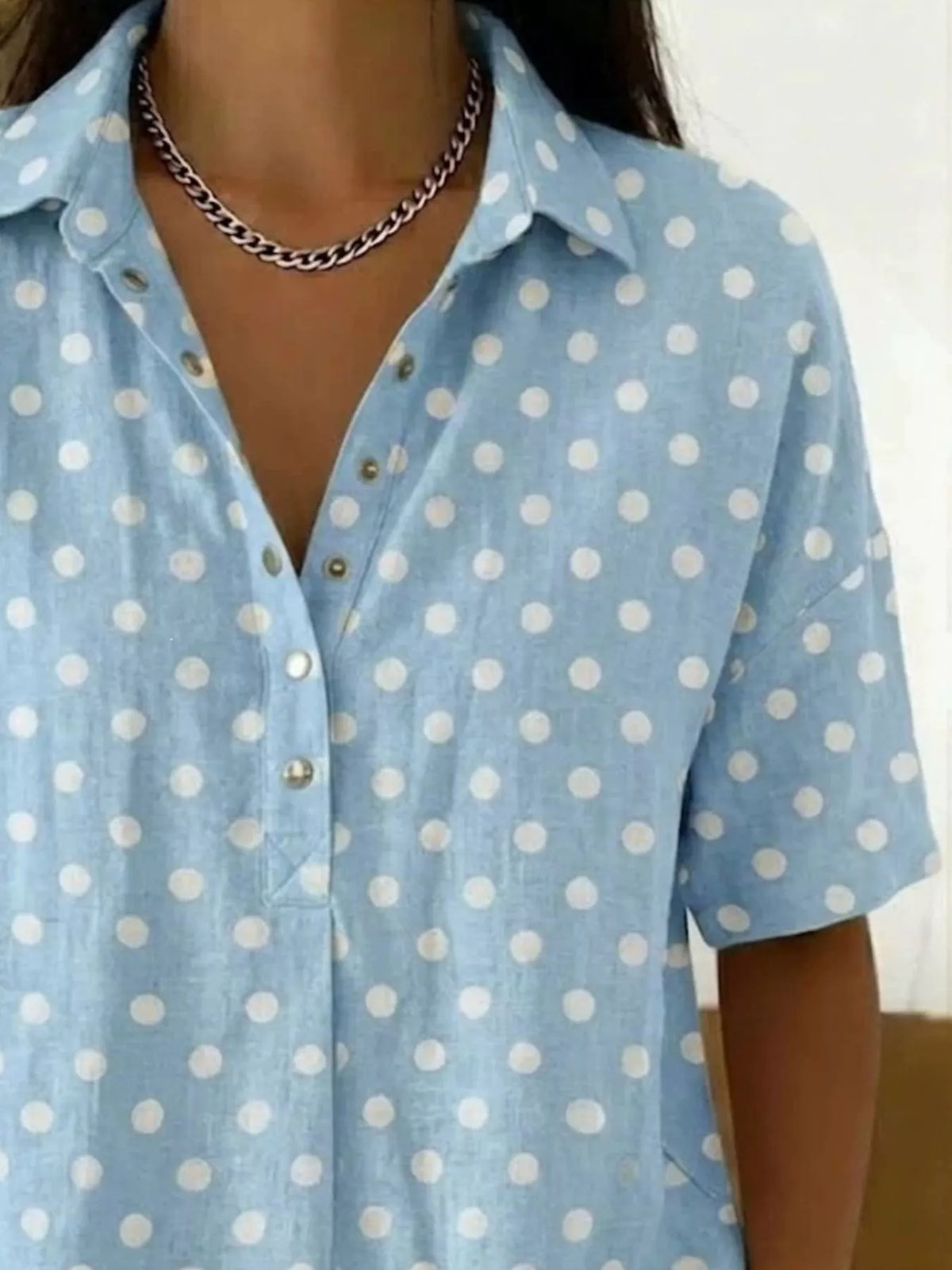 Polka dot shirt collar and button placket detail