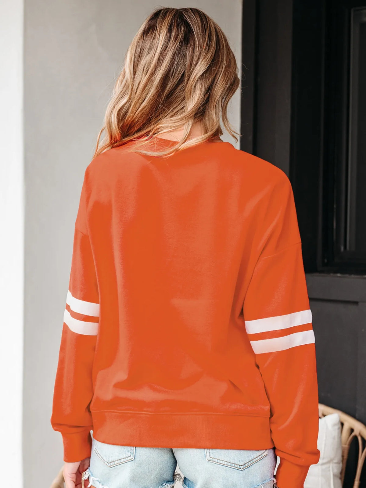Long sleeve striped sweatshirt side view