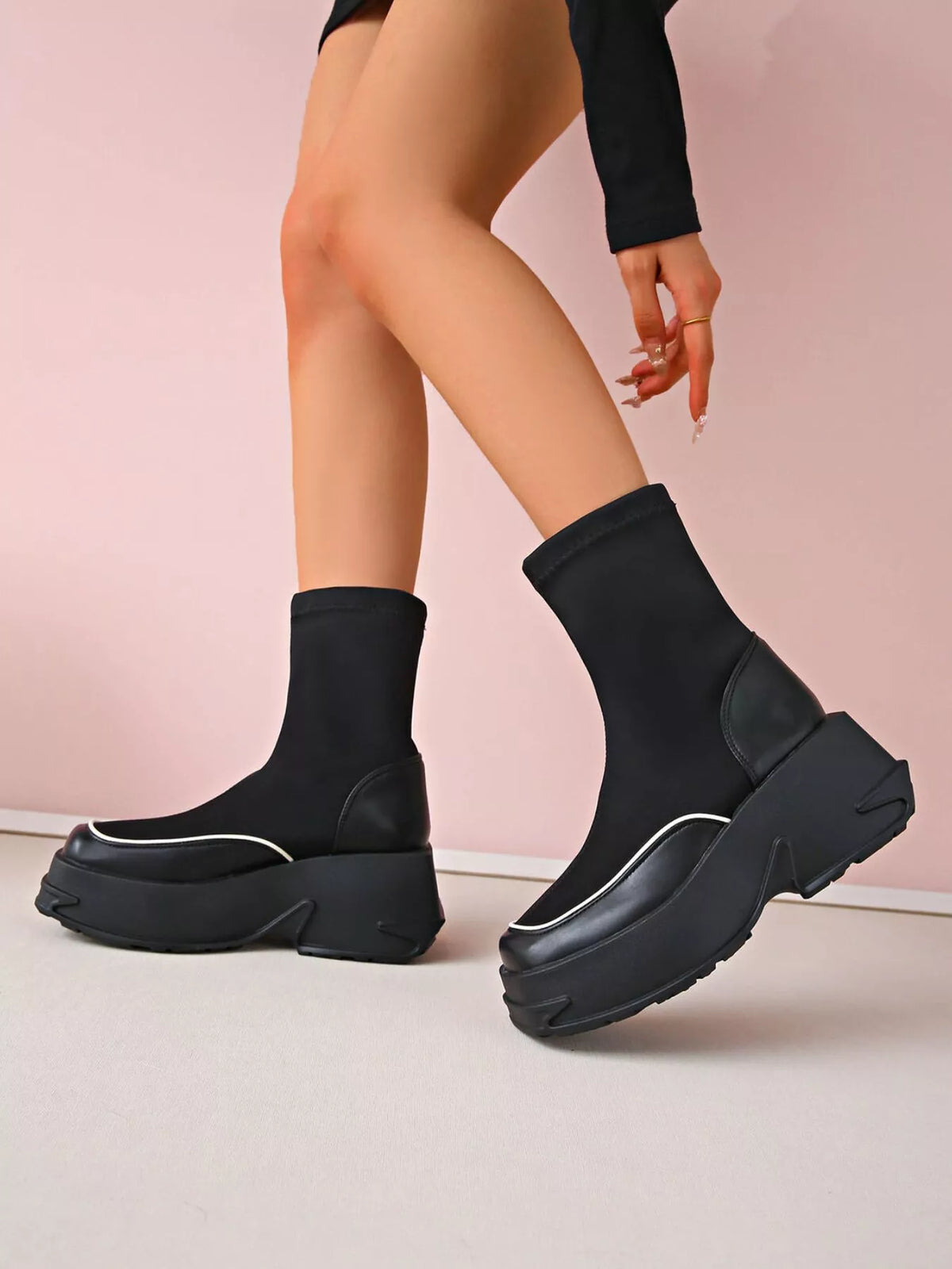 Round toe platform boots back heel view