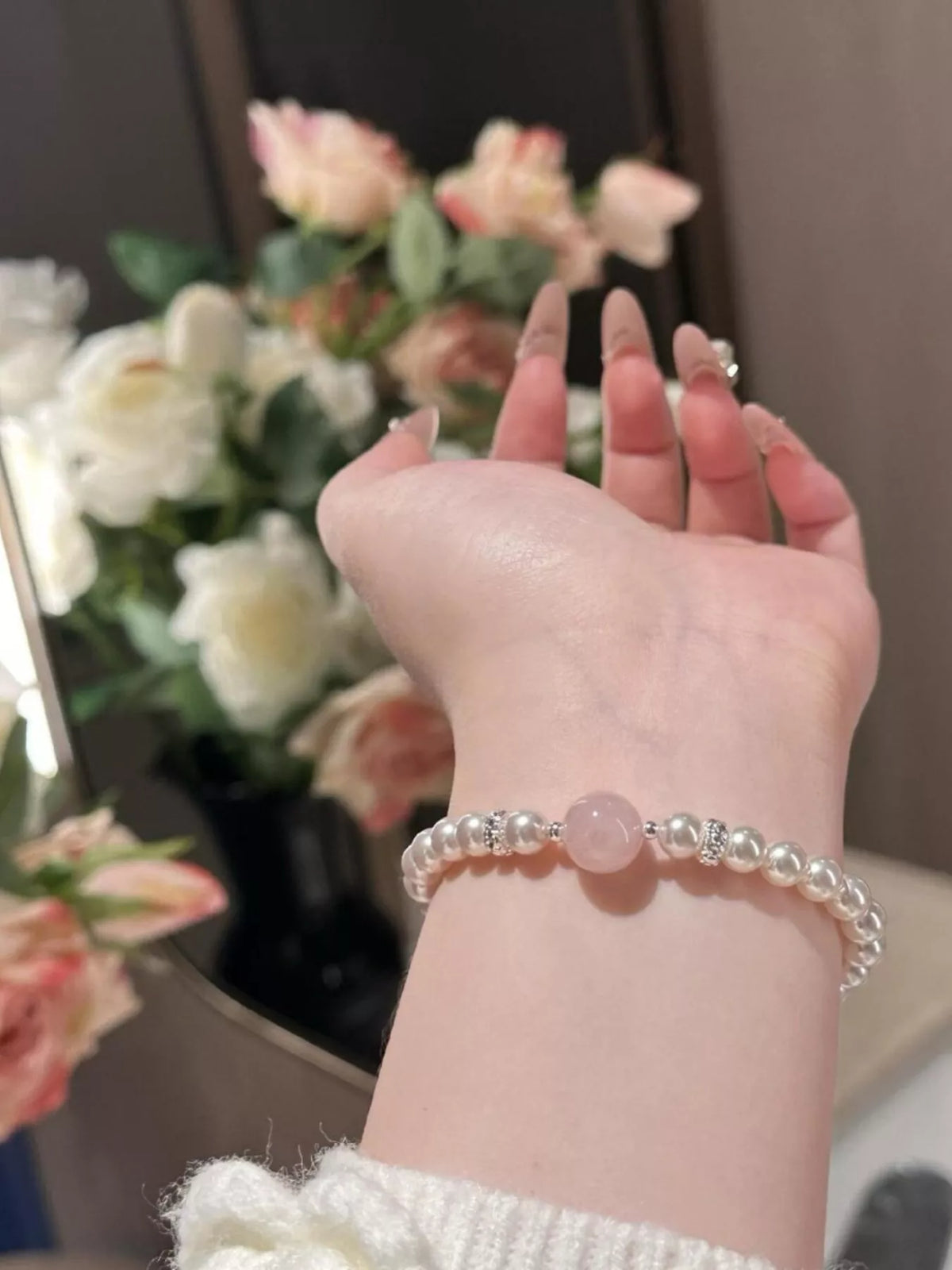 Blush pink pearl and crystal bracelet on model