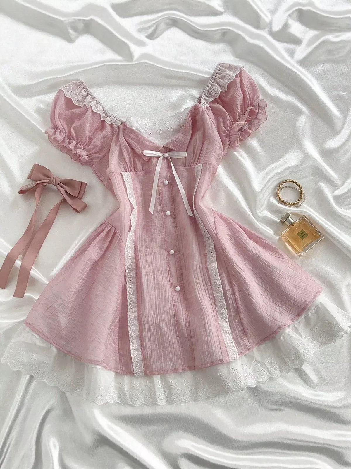 Full length view of the lace detail cap sleeve dress