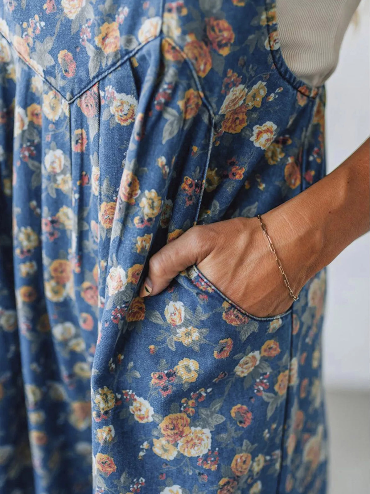 Wide leg floral overalls hemline detail