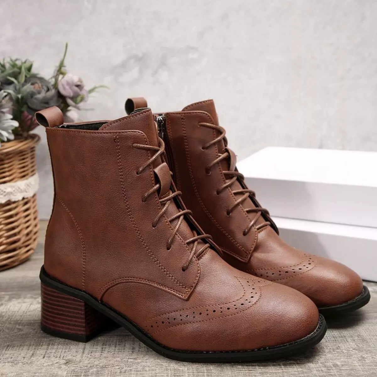 Lace up ankle boots with zipper lace and strap detail
