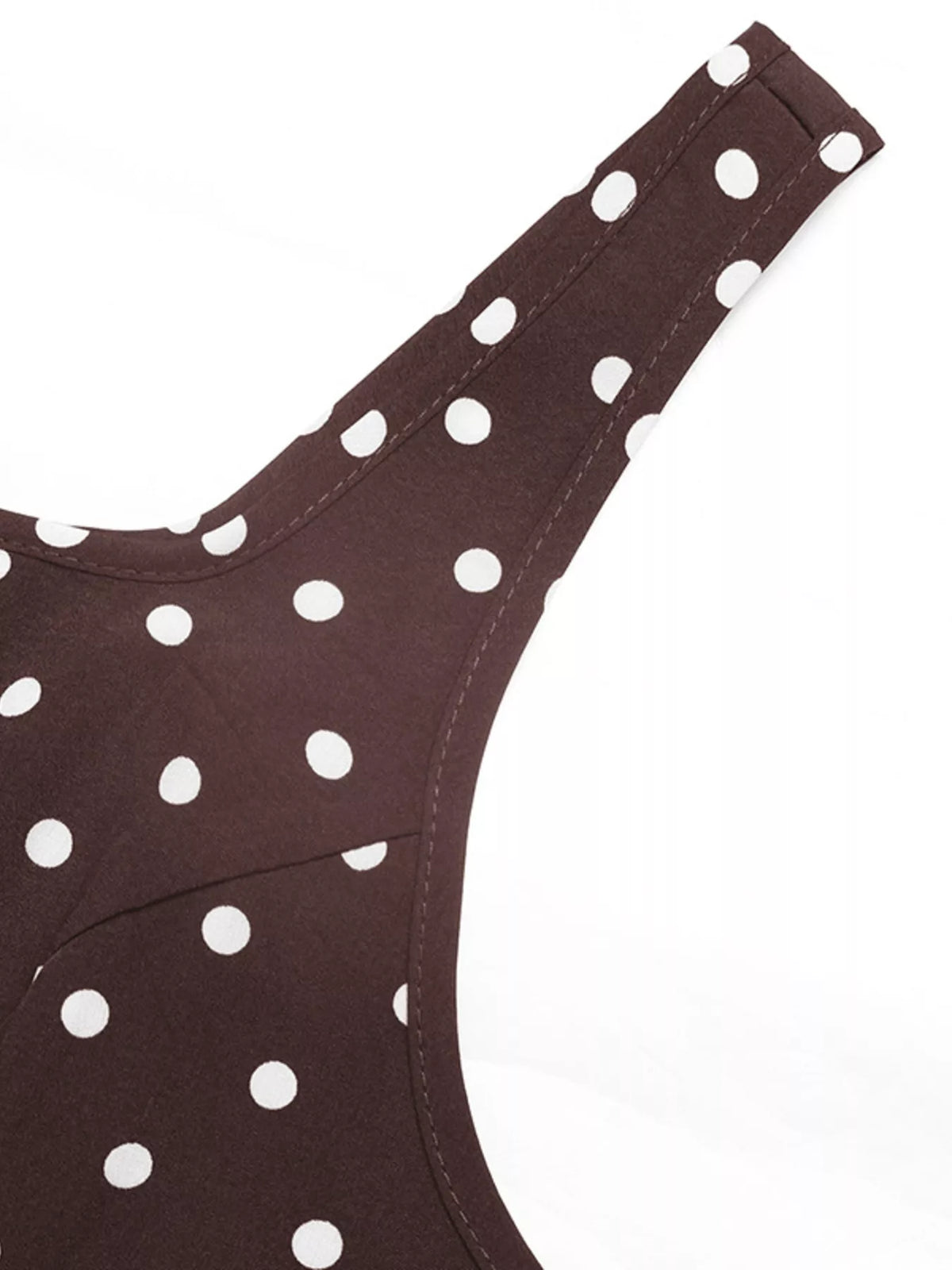 Polka dot sleeveless maxi dress in coffee brown close up view