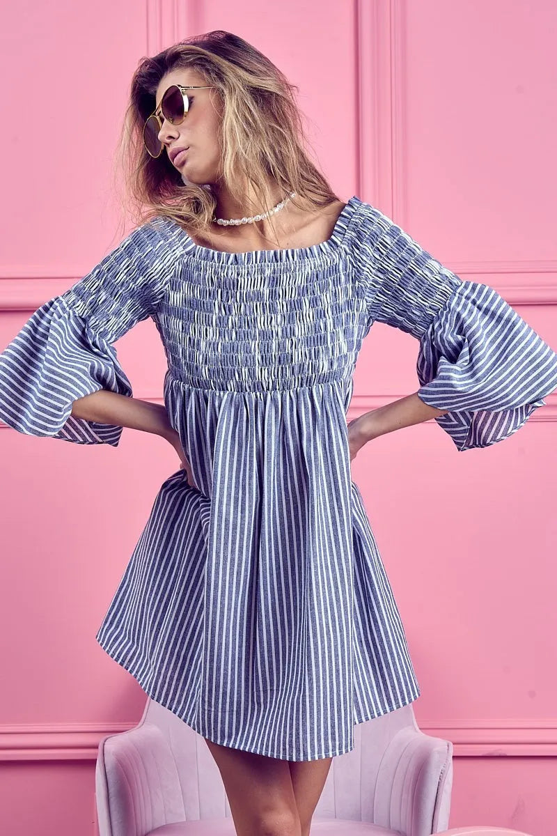 Smocked Off Shoulder Striped Dress on model