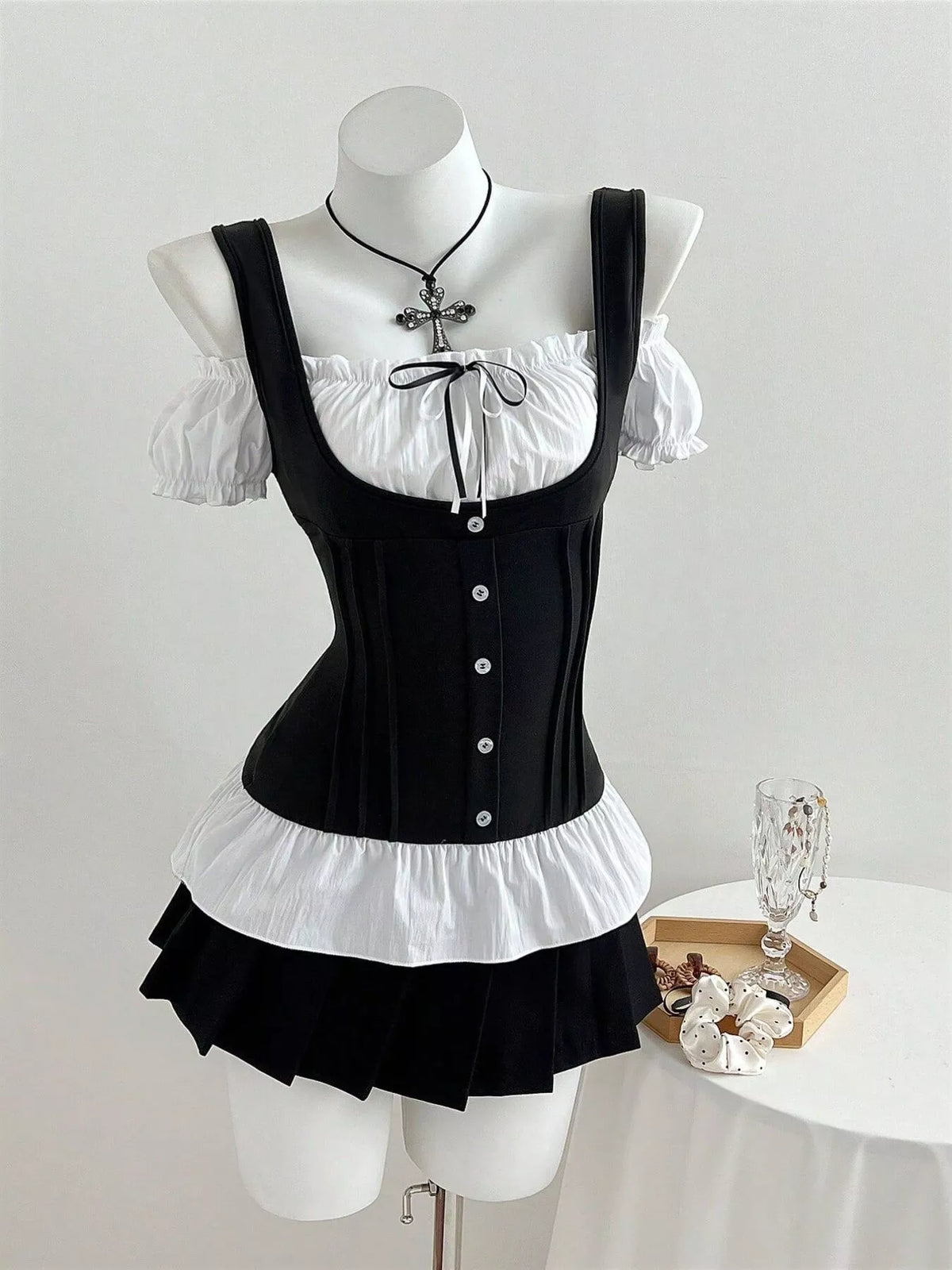 Cold shoulder ruched top front view on model