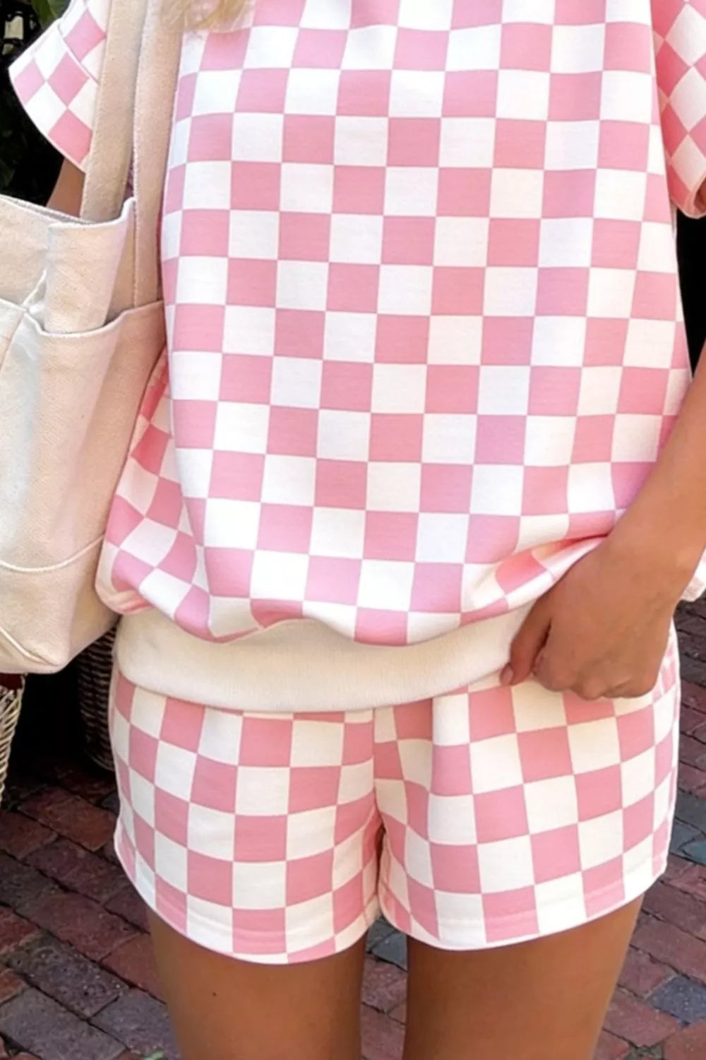 Matching checkerboard shorts detail