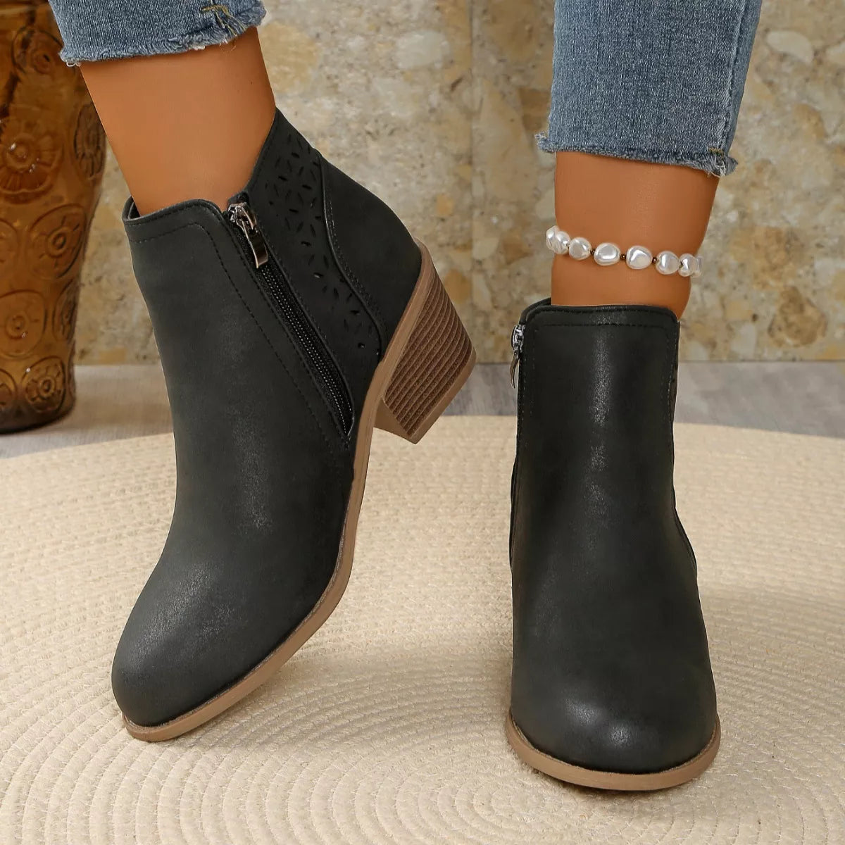 Point toe block heel boots detail of the heel
