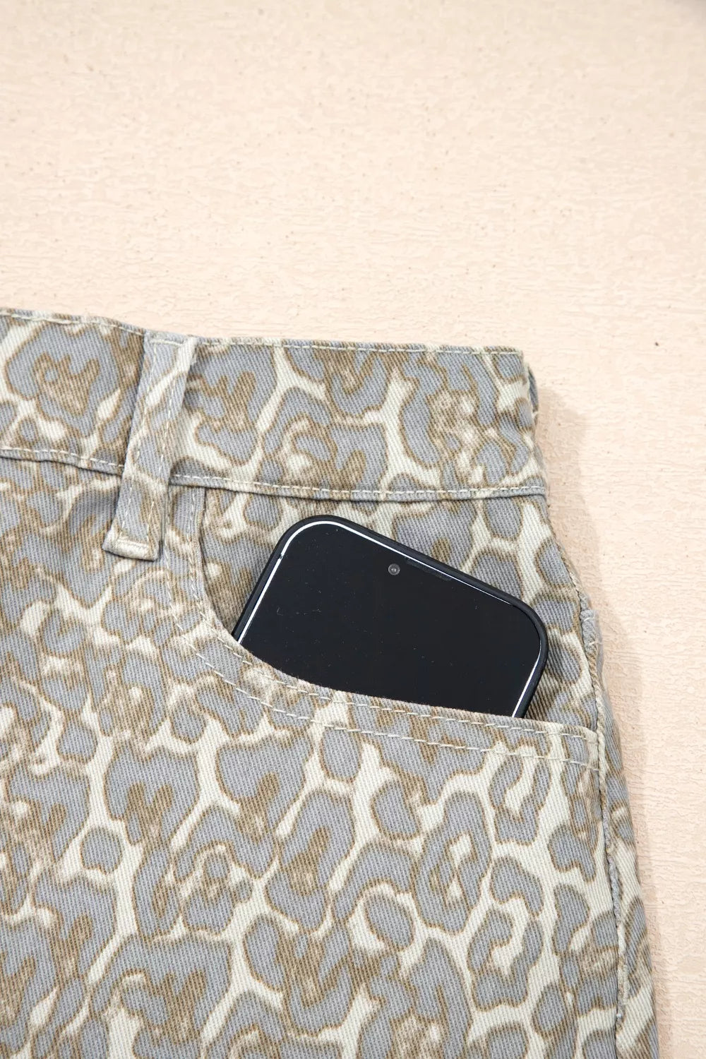Khaki leopard print raw edge denim shorts fabric detail