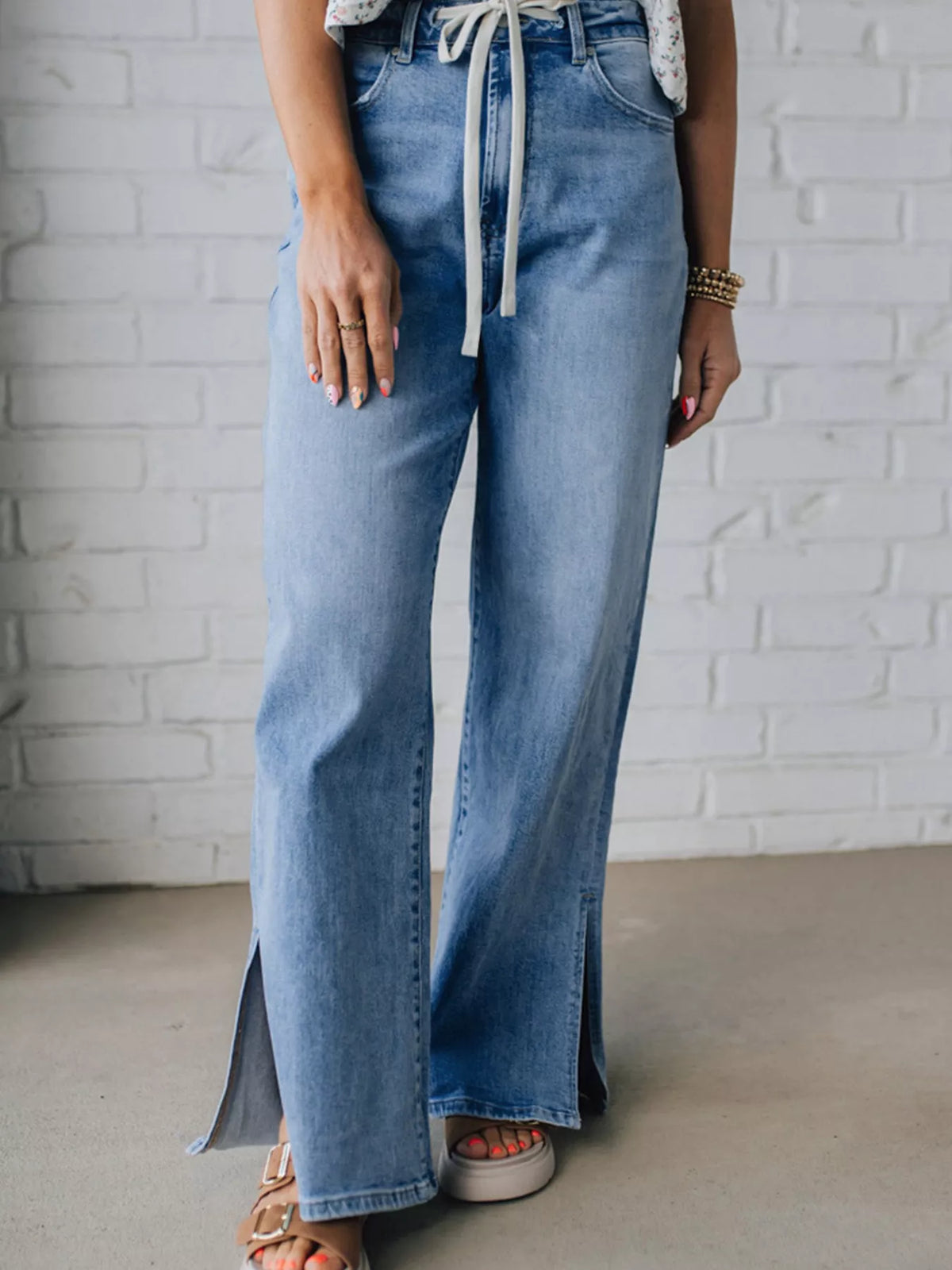 Side view of medium wash wide leg jeans