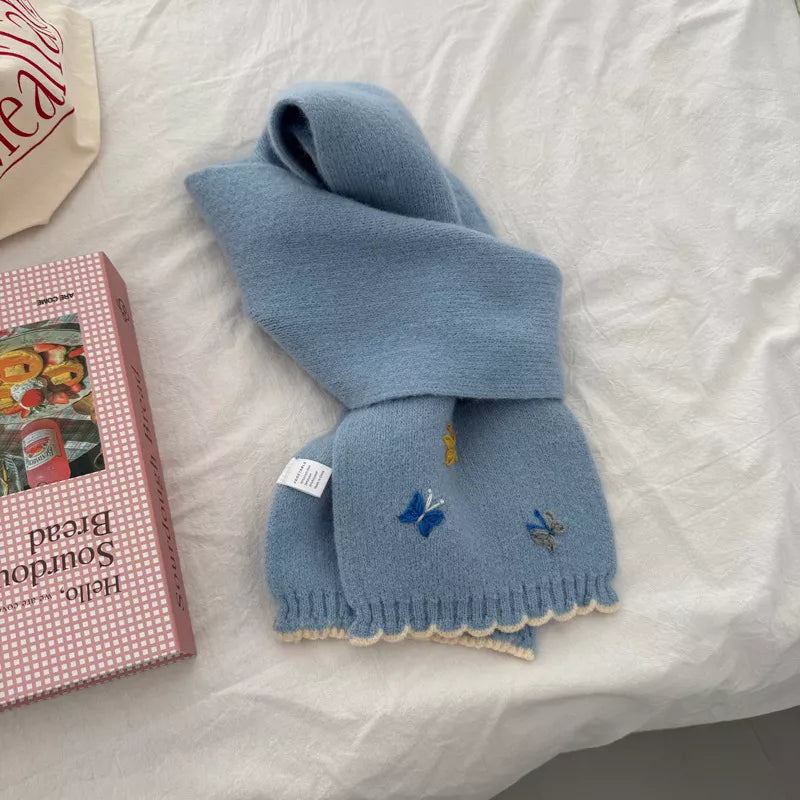 Butterfly scarf shown in a deeper color tone