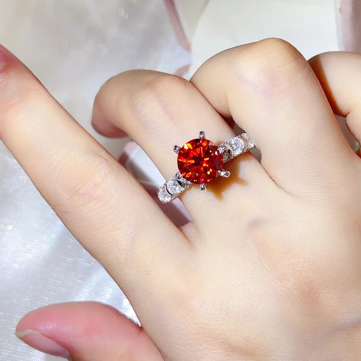 Starglow 3 carat red moissanite ring in sterling silver, front view