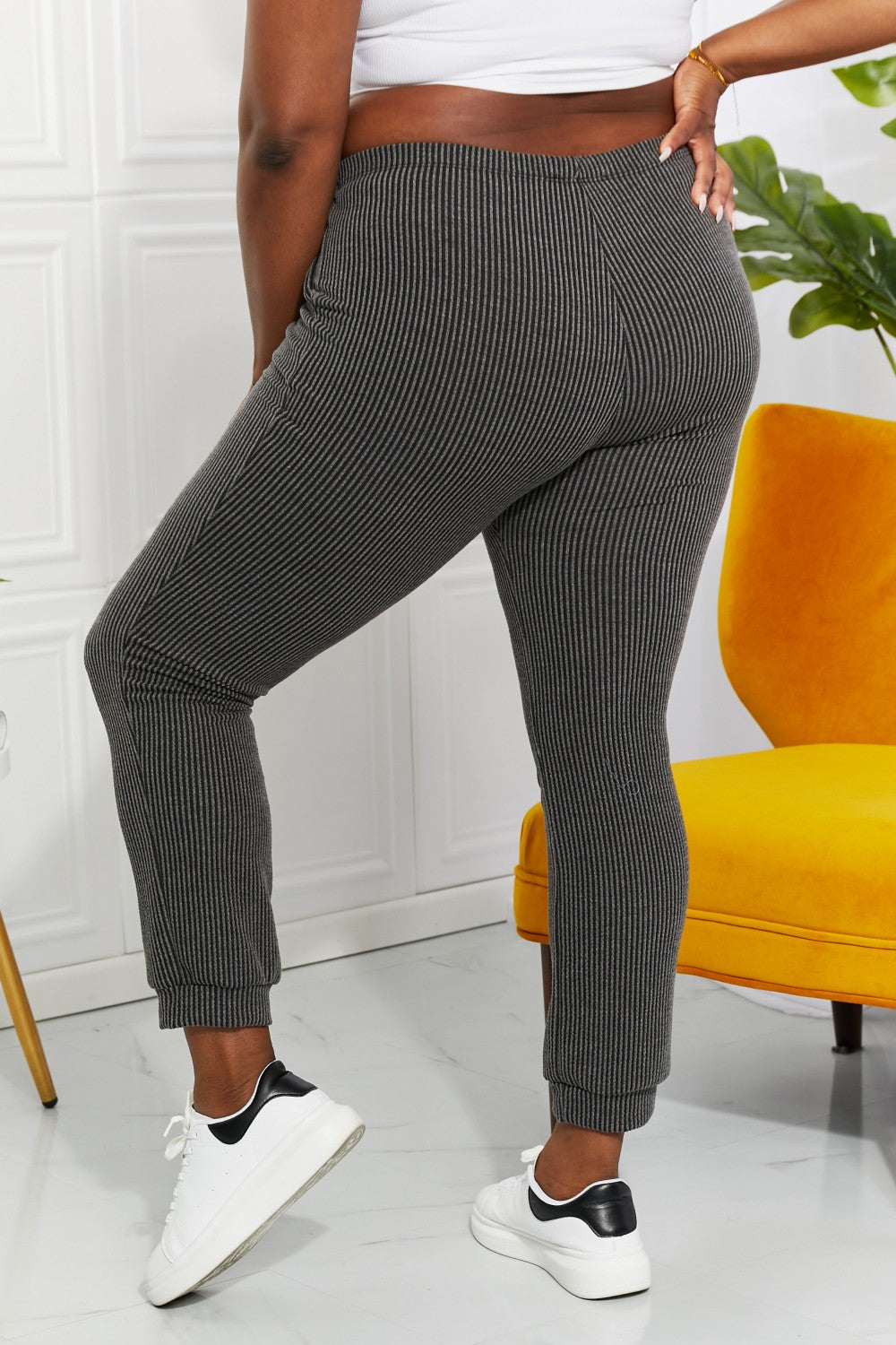 Pocket detail on dark gray ribbed joggers